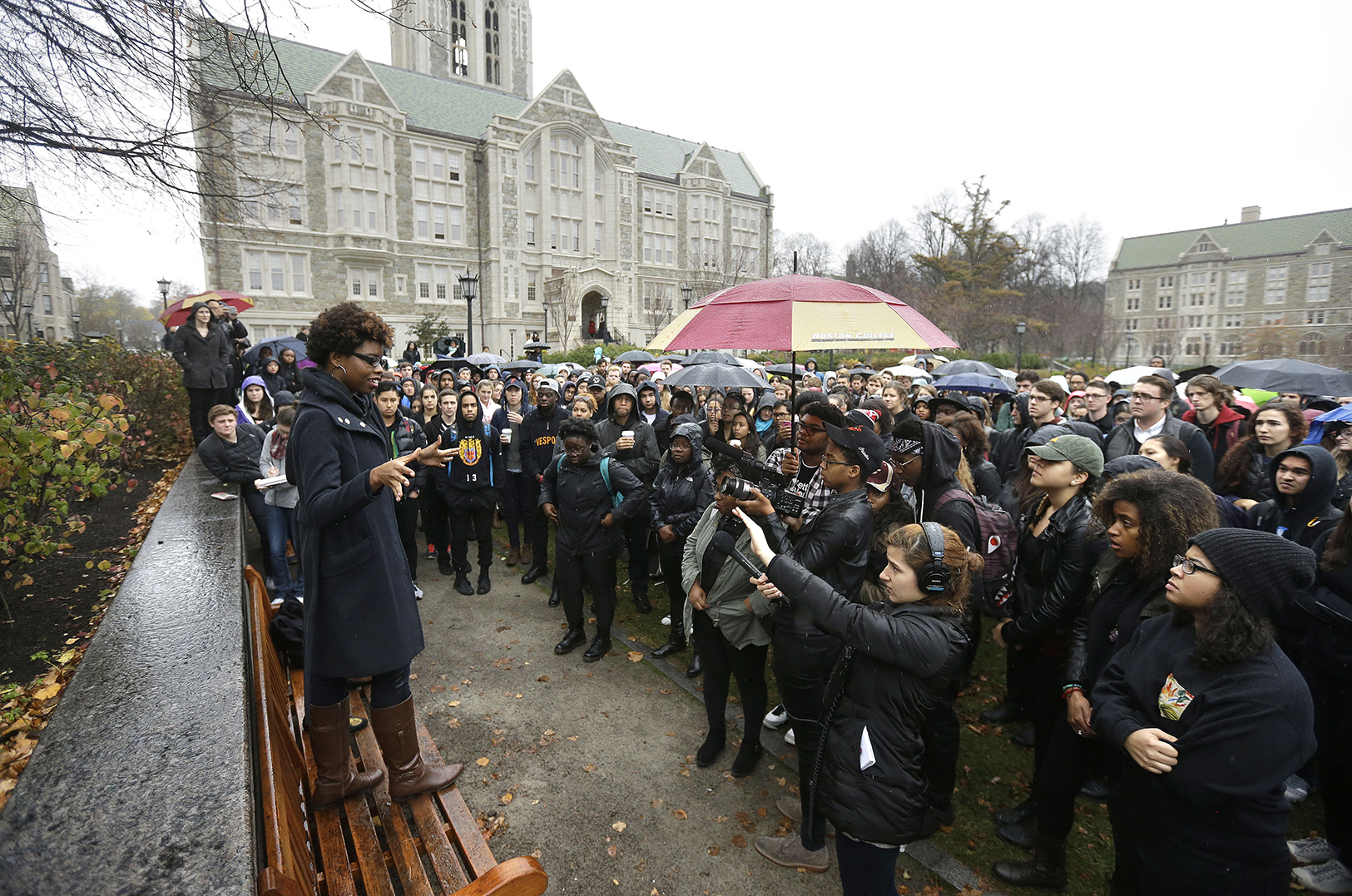 Students at Boston College listen to a speaker as they gather during a solidarity demonstration on the school's campus, Thursday, Nov. 12, 2015, in Newton, Mass. The protest was among numerous campus actions around the country following the racially charged strife at the University of Missouri. The speaker at left asked not to be identified. (AP)