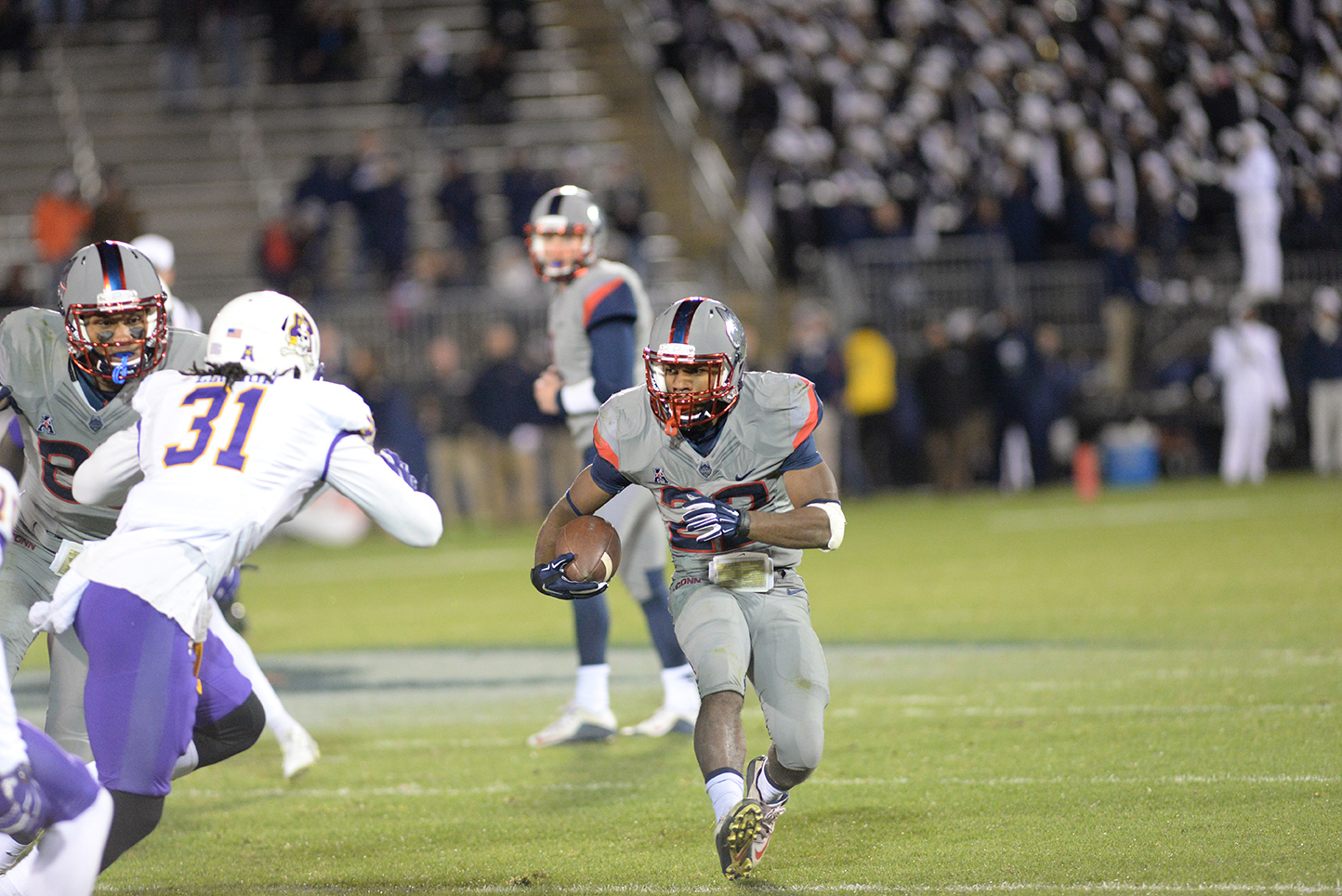 UConn running back Arkeel Newsome scampers for yards against East Carolina on October 30th, 2015. Newsome has a team high six touchdowns. (Ashley Maher/The Daily Campus).