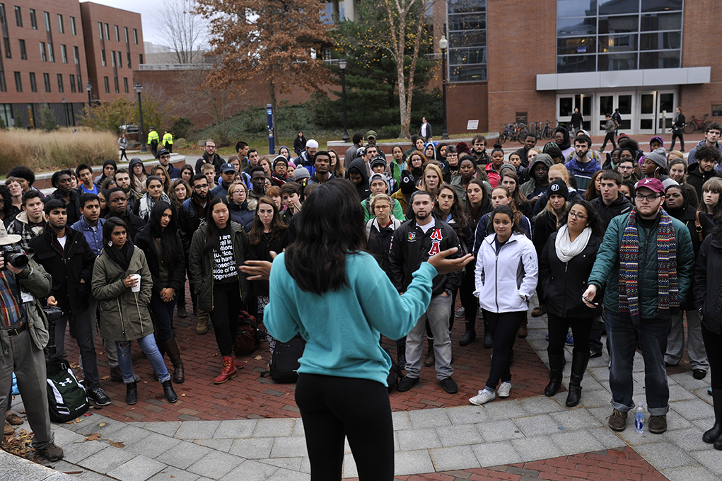 Nearly 300 UConn students gathered in the wind and rain on Fairfield Way to show solidarity with movements against racism happening on other campuses across the country on Thursday, Nov. 19, 2015. (Jason Jiang/The Daily Campus)