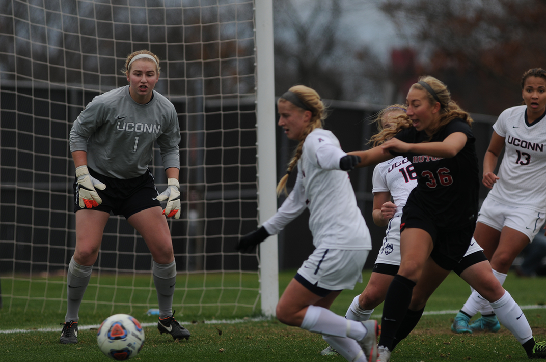 UConn junior goalkeeper Emily Armstrong marshals the defense during the Huskies' Sweet 16 game against Rutgers in Piscataway, New Jersey on Sunday, Nov. 22, 2015. (Bailey Wright/The Daily Campus)