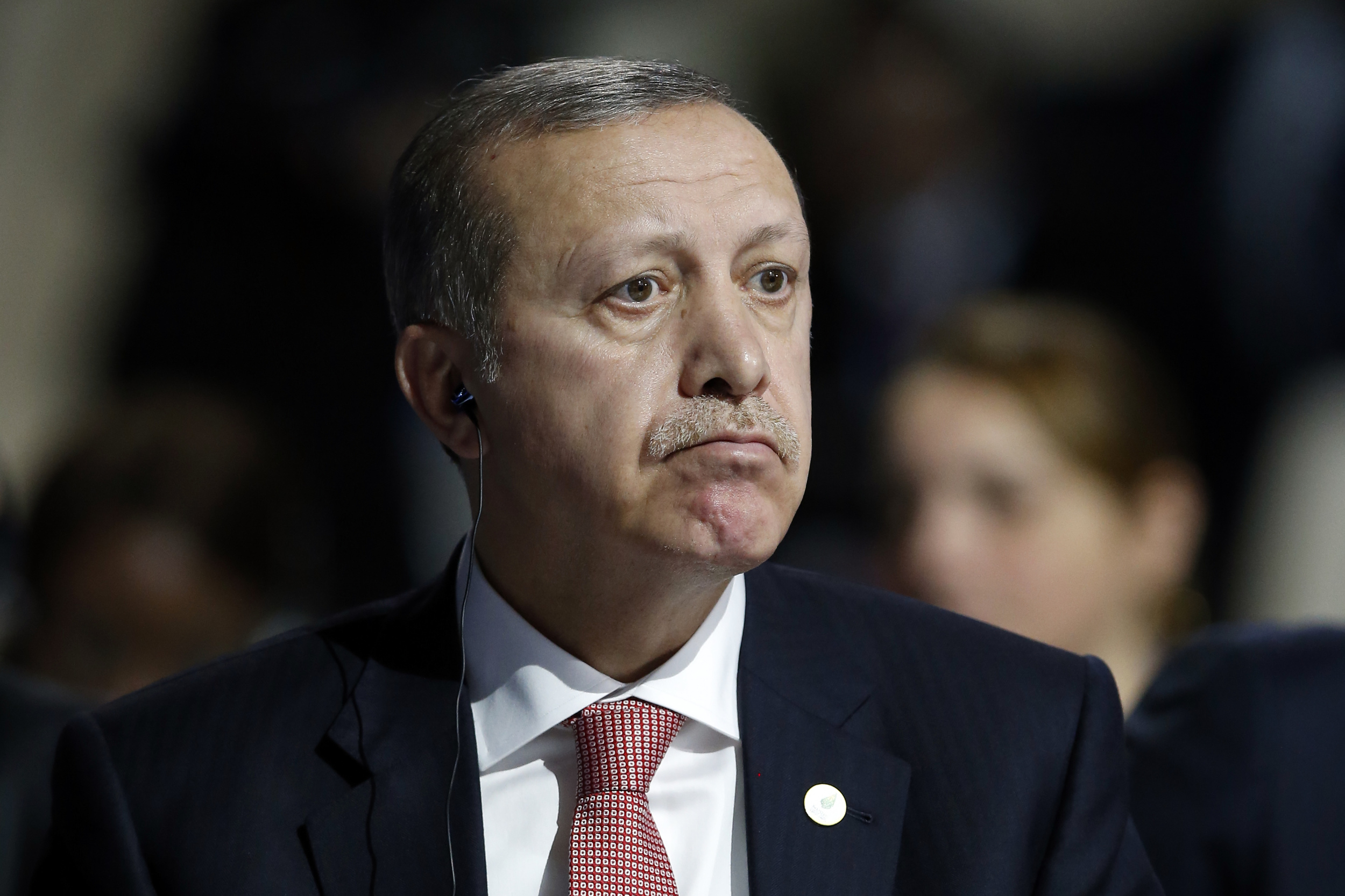 Turkey's President Recep Tayyip Erdogan listens to statements at the COP21, United Nations Climate Change Conference, in Le Bourget, outside Paris, Monday, Nov. 30, 2015. (Francois Mori/AP)