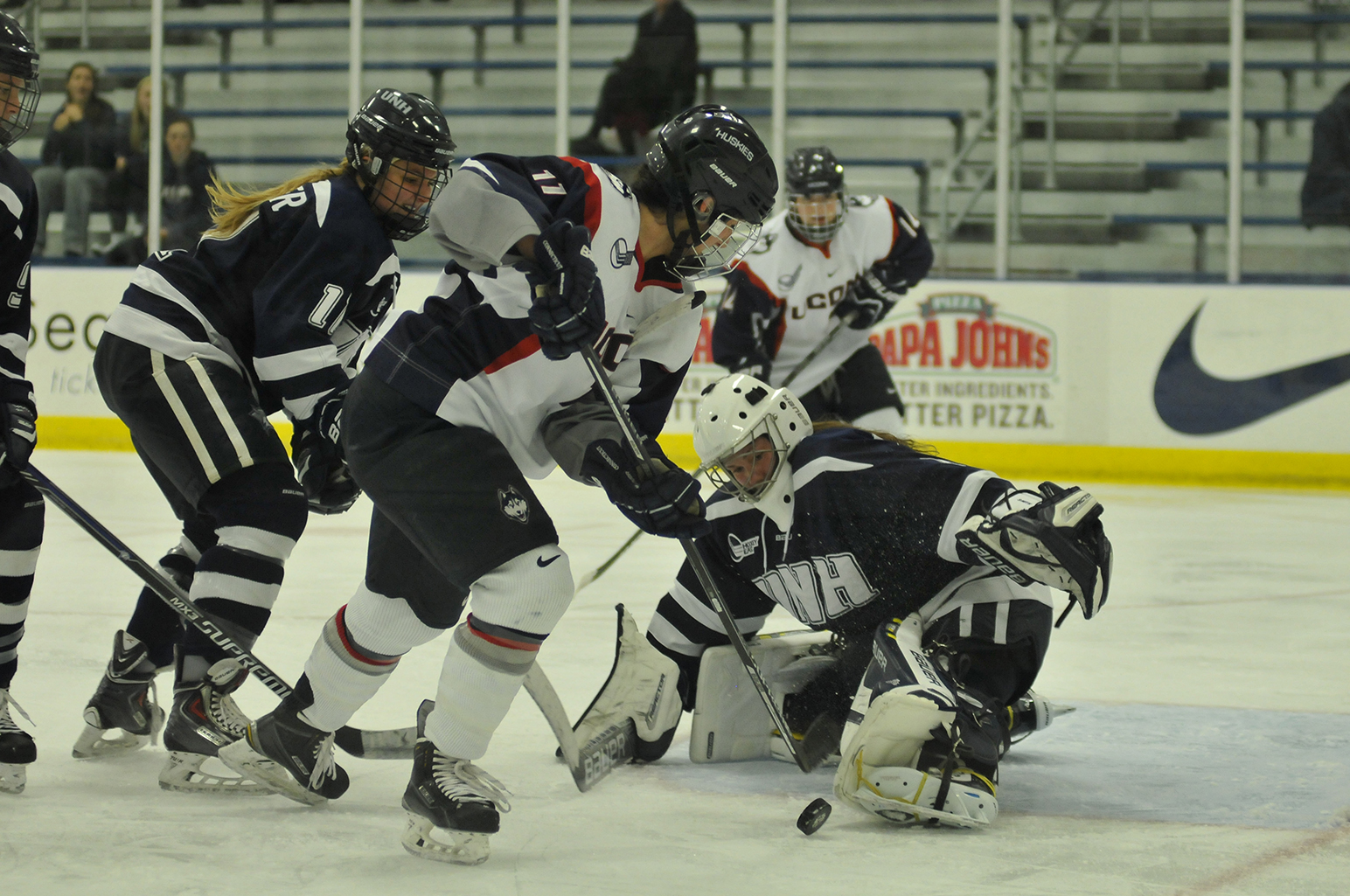 Senior forward Brittany Berisoff (#11) has a shot saved during UConn's 2-1 loss against New Hampshire on November 11, 2015. Berisoff has five goals this season. (Jason Jiang/The Daily Campus)