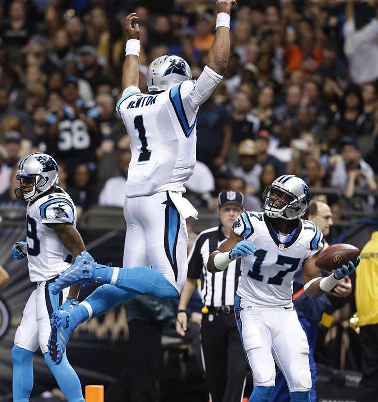 Carolina Panthers wide receiver Devin Funchess (17) celebrates his touchdown reception with quarterback Cam Newton (1) in the second half of an NFL football game against the New Orleans Saints in New Orleans, Sunday, Dec. 6, 2015. (AP Photo/Jonathan Bachman)