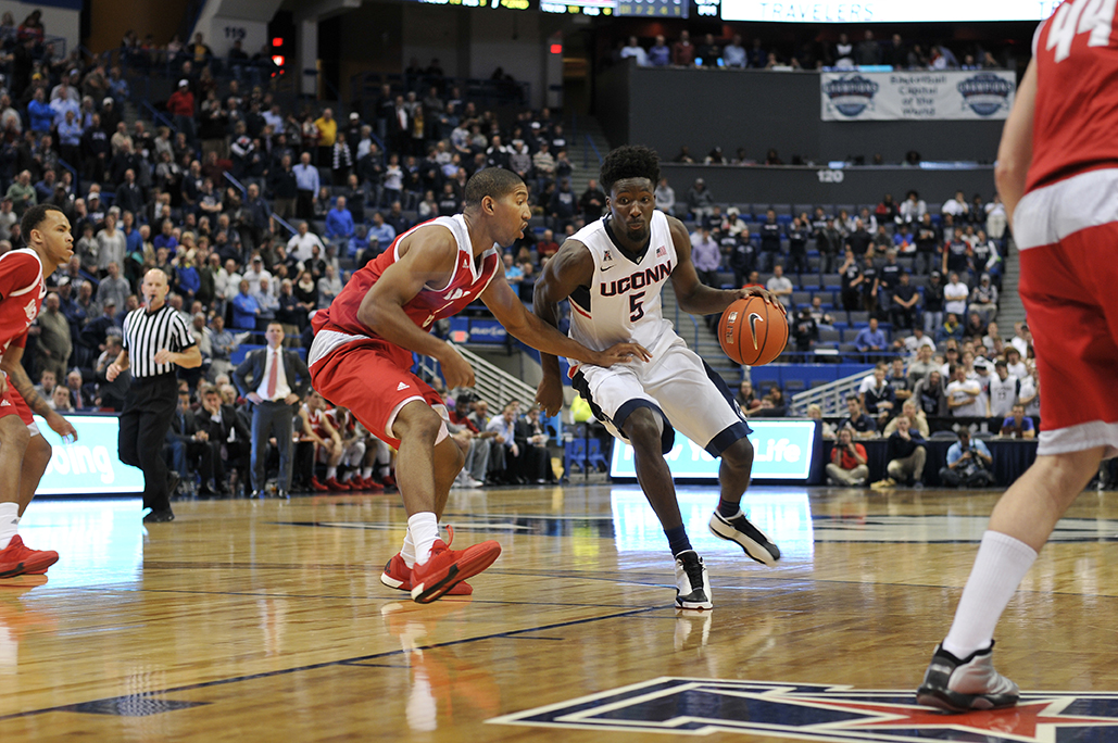 Daniel Hamilton (#5) drives to the rim during UConn's 82-49 win against Sacred Heart at the XL Center. Hamilton leads the Huskies in assists and rebounds per game. (Bailey Wright/The Daily Campus).