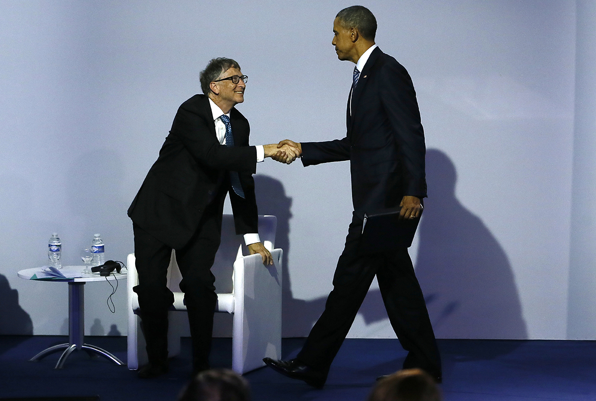 US President Barack Obama, right, shakes hands with Microsoft CEO Bill Gates during the 'Mission Innovation: Accelerating the Clean Energy Revolution' meeting at the COP2, United Nations Climate Change Conference, in Le Bourget, north of Paris, Monday, Nov. 30 2015. (AP)
