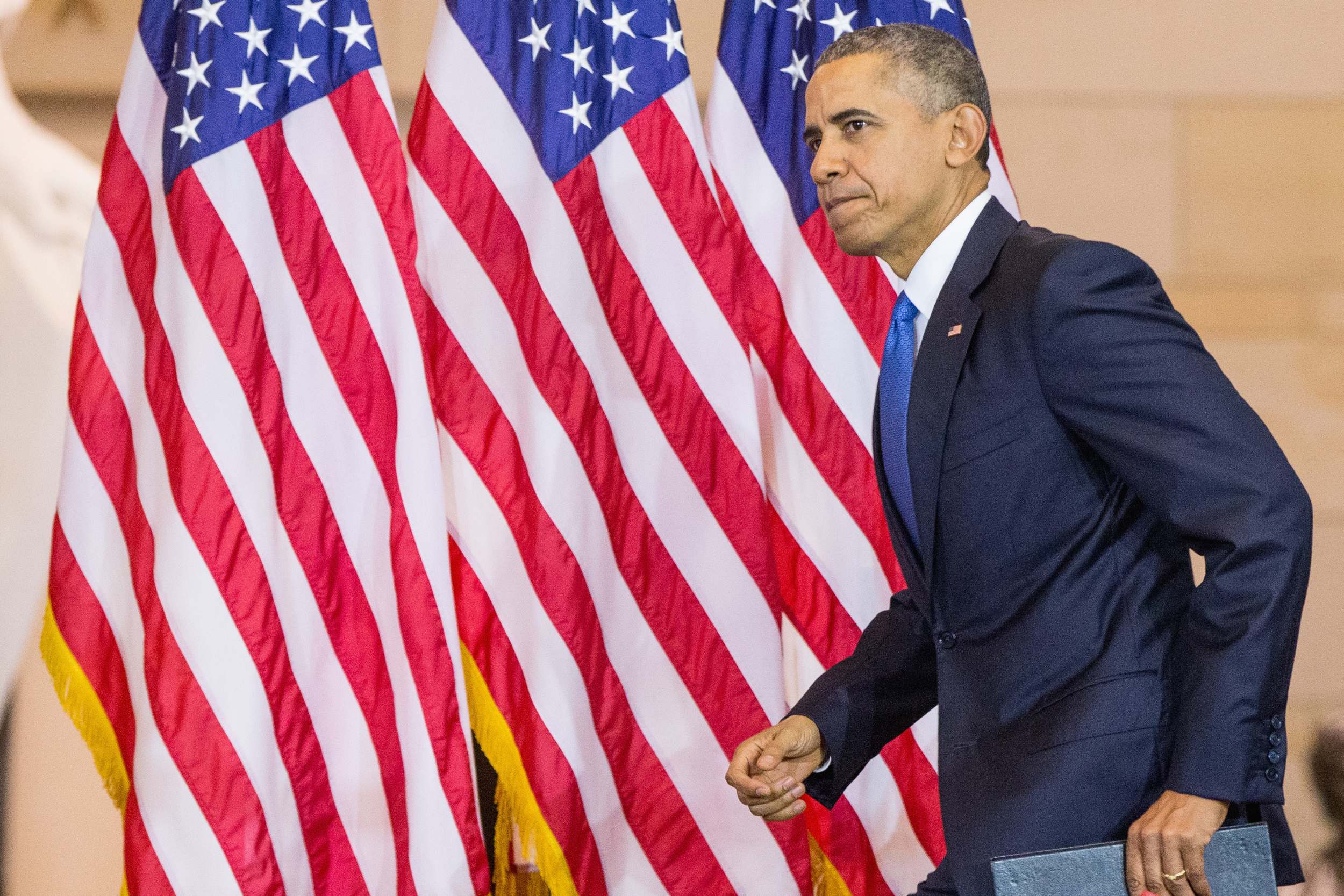 President Barack Obama takes the podium in Emancipation Hall on Capitol Hill in Washington, Wednesday, Dec. 9, 2015, to speak during a commemoration ceremony for the 150th anniversary of the ratification of the 13th Amendment to the U.S. Constitution which abolished slavery in the U.S. (Andrew Harnik/AP)