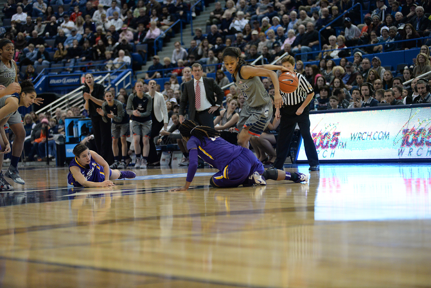 Guard Moriah Jefferson goes behind her back for a highlight play during UConn's 86-40 win over LSU Monday evening. The senior finished with 17 points. (Ashley Maher/The Daily Campus)