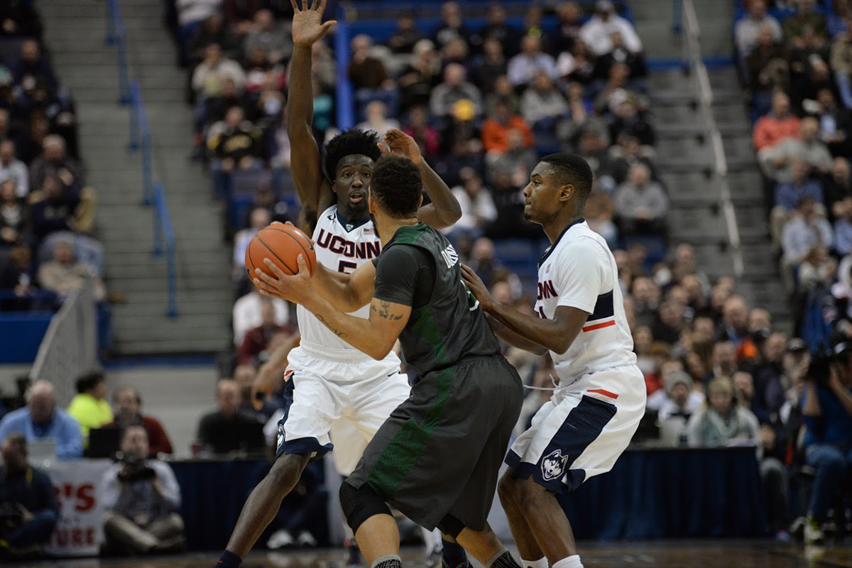 Daniel Hamilton, 5, and Sterling Gibbs double team a Tulane player during UConn's 60-42 win on Jan. 19, 2016 at the XL Center. The Huskies forced 16 turnovers, leading to 16 points. (Ashley Maher/The Daily Campus)