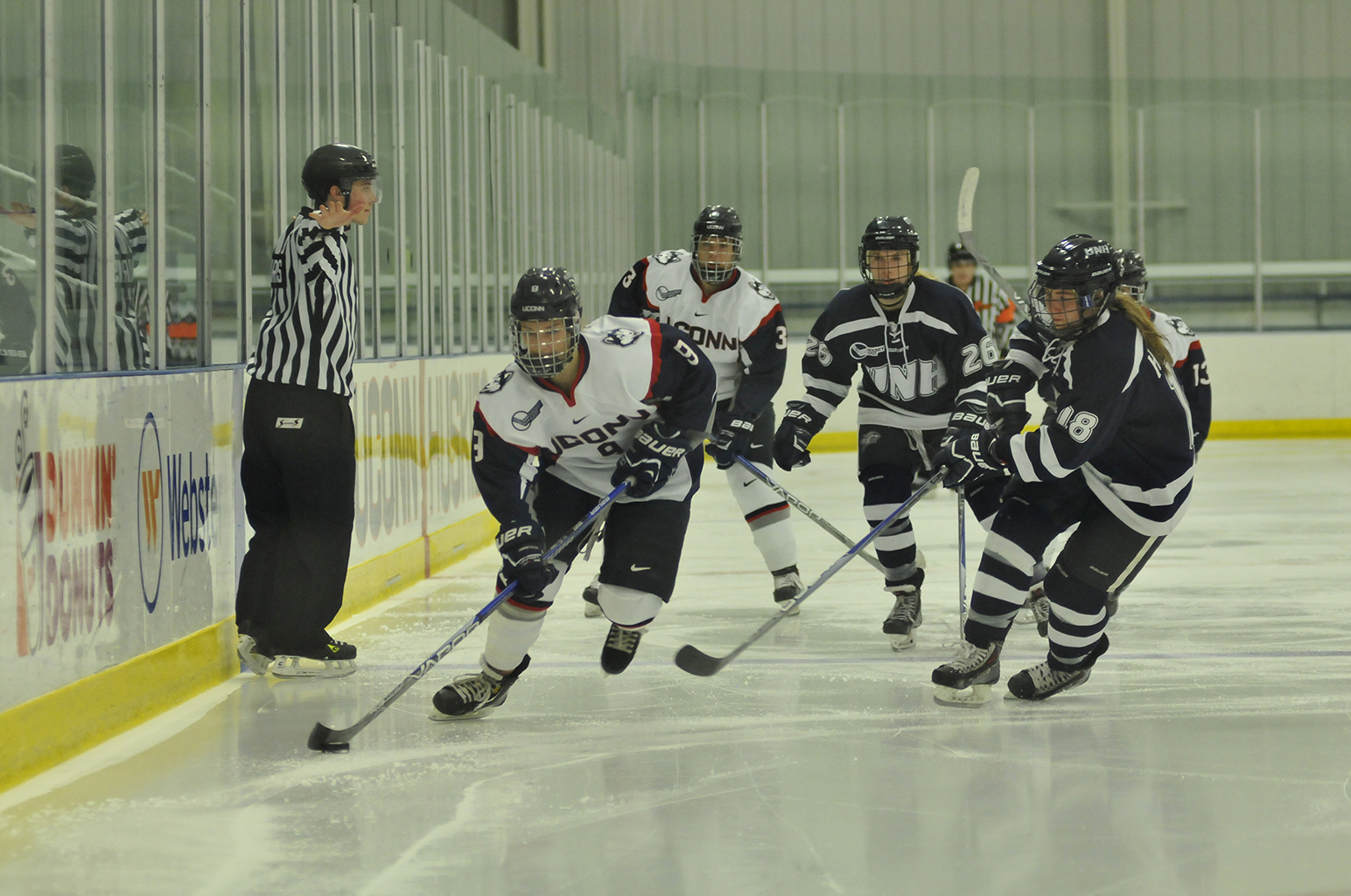 UConn junior defender Jessica Stott handles the puck during the Huskies' game against New Hampshire at the Freitas Ice Forum in Storrs, Connecticut on Sunday, Nov. 8, 2015. (Jason Jiang/The Daily Campus)
