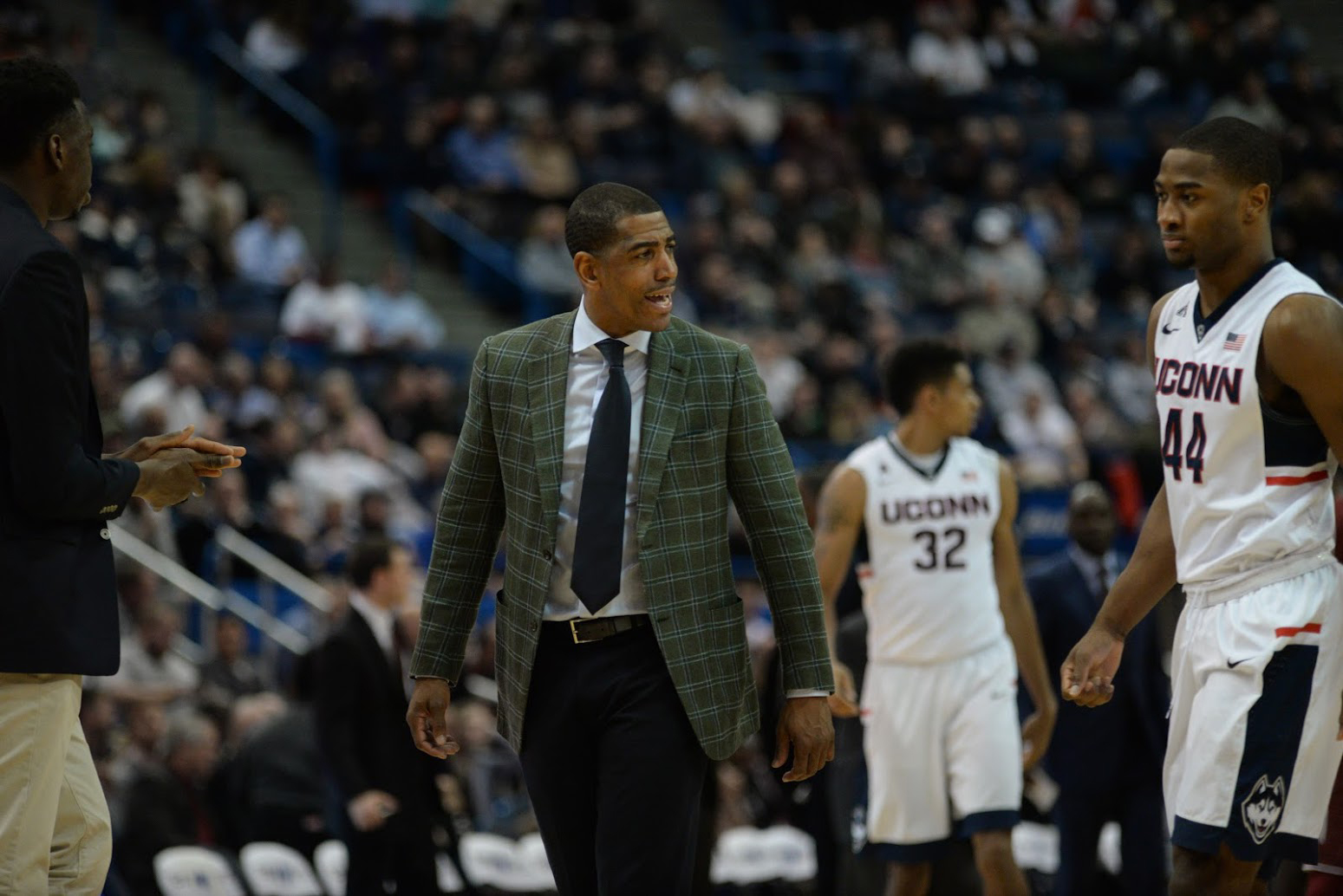 UConn head coach Kevin Ollie offers instruction during a loss to Temple. One of the top recruits in Ollie's tenure, Zach Brown, will transfer to a high school in Connecticut. (Ashley Maher/The Daily Campus).