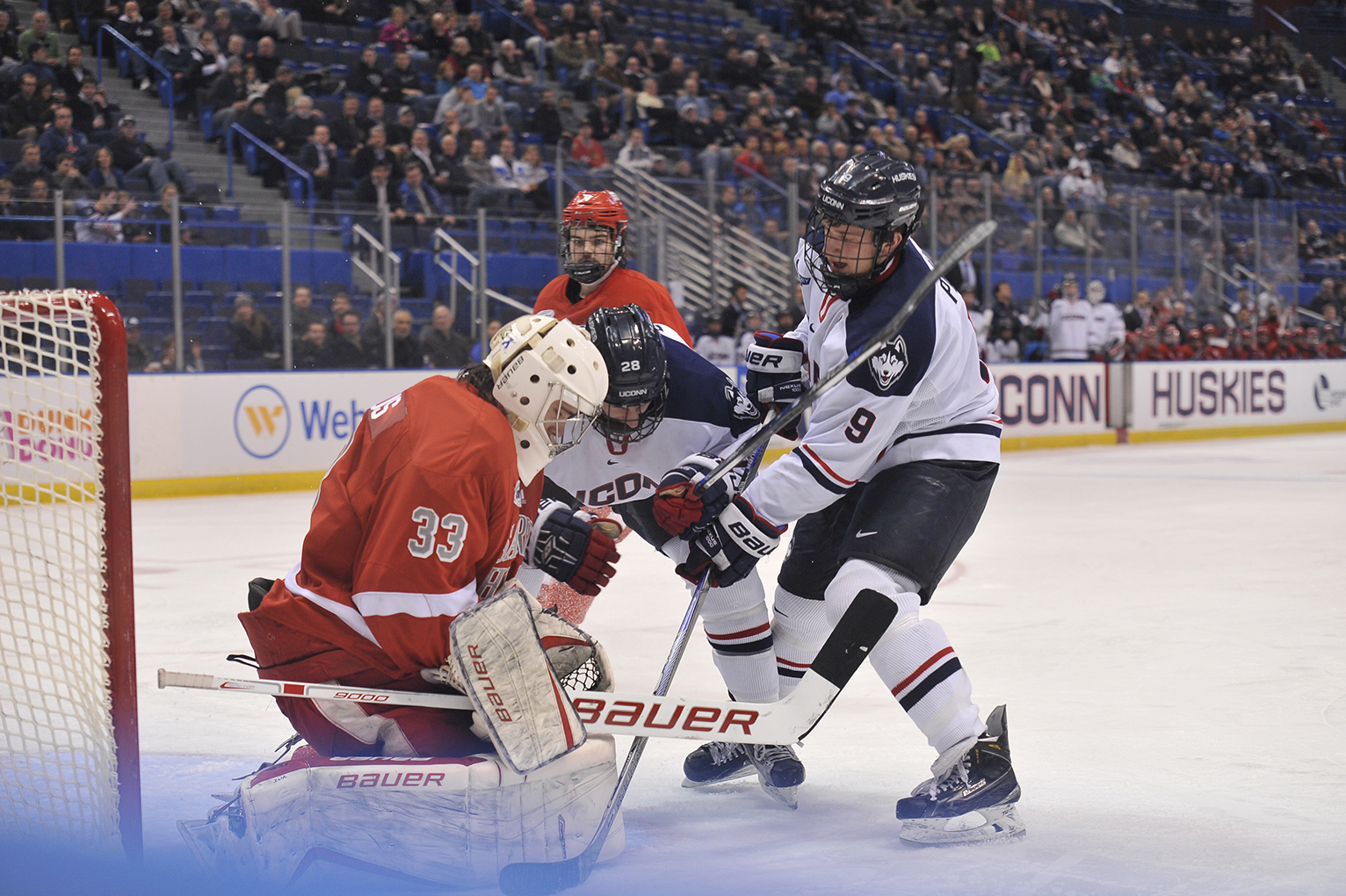 Shawn Pauly works to put the puck in the net during UConn's 7-4 loss to Sacred Heart at the XL Center on Tuesday January 26, 2016. (Jason Jiang/The Daily Campus)