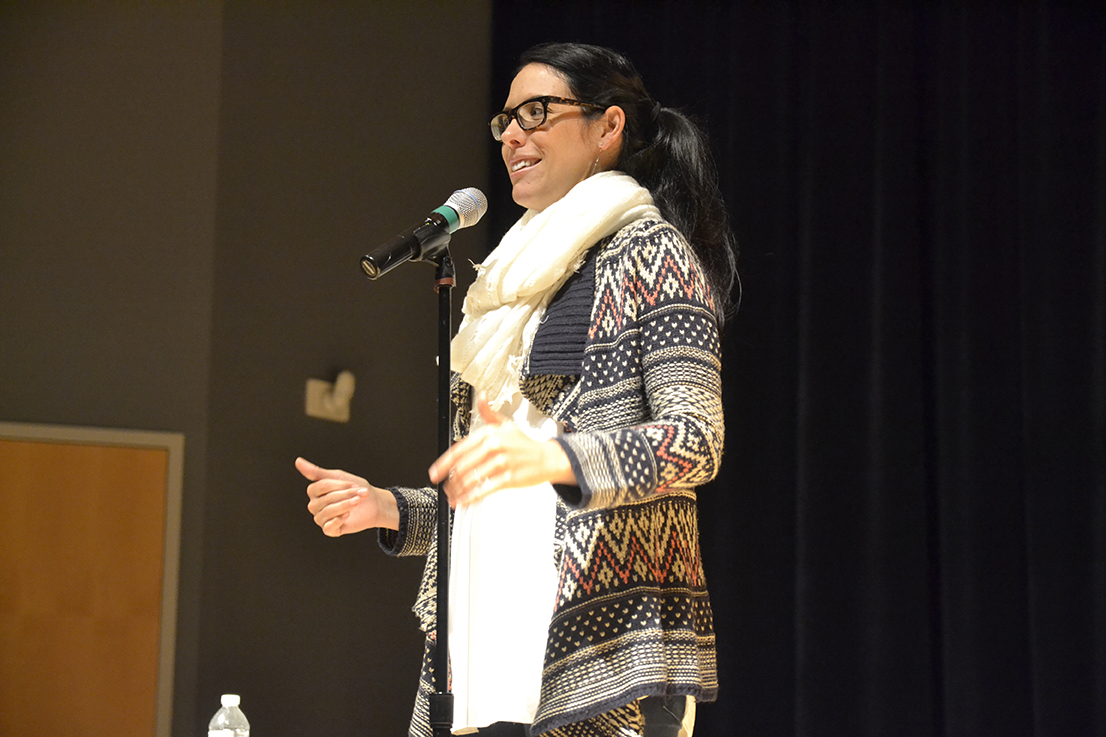 Spoken word poet Katie Wirsing speaks at a spoken word poetry event in the Student Union Theater on Thursday, Jan. 28, 2016. Wirsing, a former member of the 2006 National Poetry Slam Championship team, has had her work featured on NPR and the BBC. (Olivia Stenger/The Daily Campus)