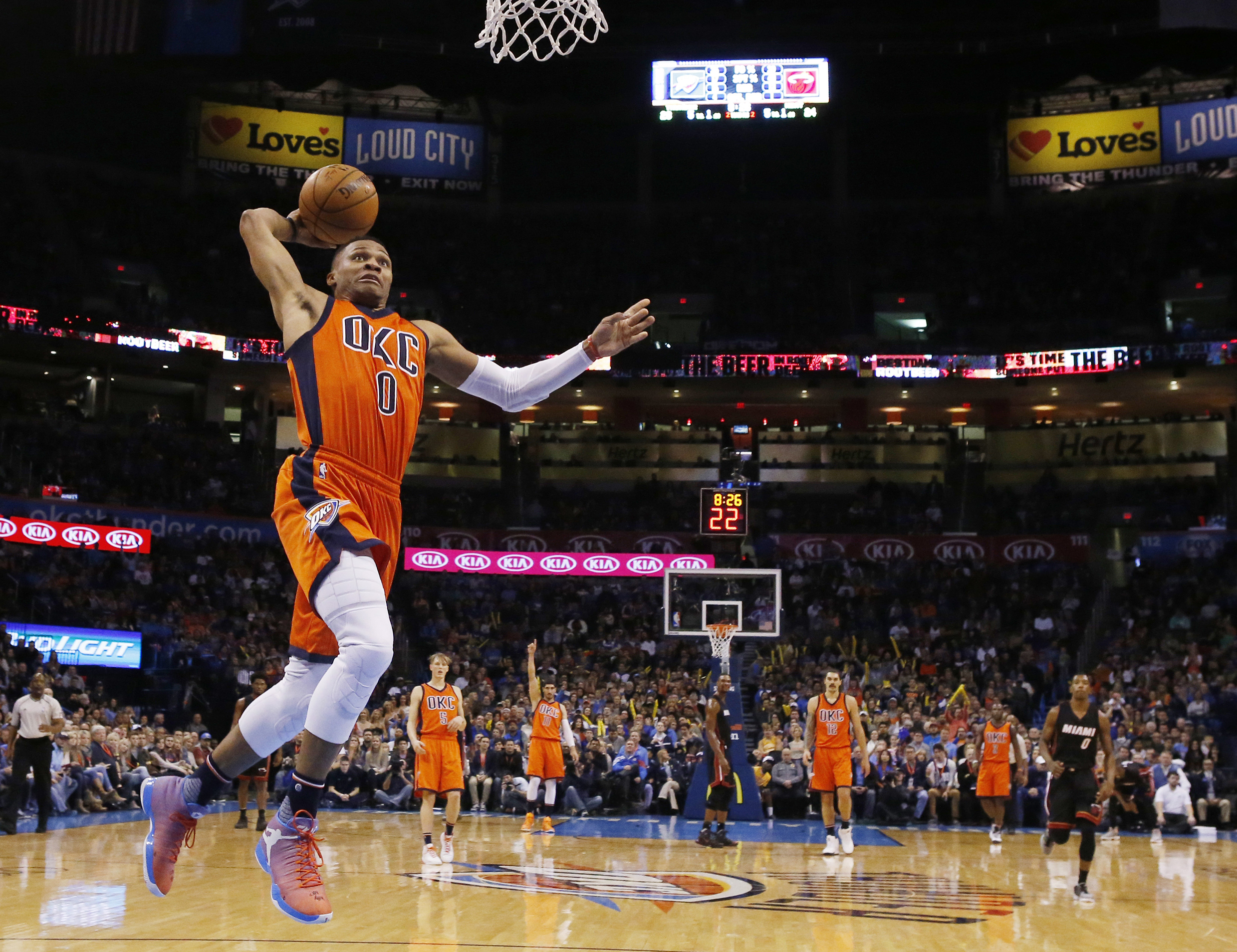 Oklahoma City Thunder guard Russell Westbrook (0) goes up for a dunk in the second quarter of an NBA basketball game against the Miami Heat in Oklahoma City, Sunday, Jan. 17, 2016. (AP Photo/Sue Ogrocki)