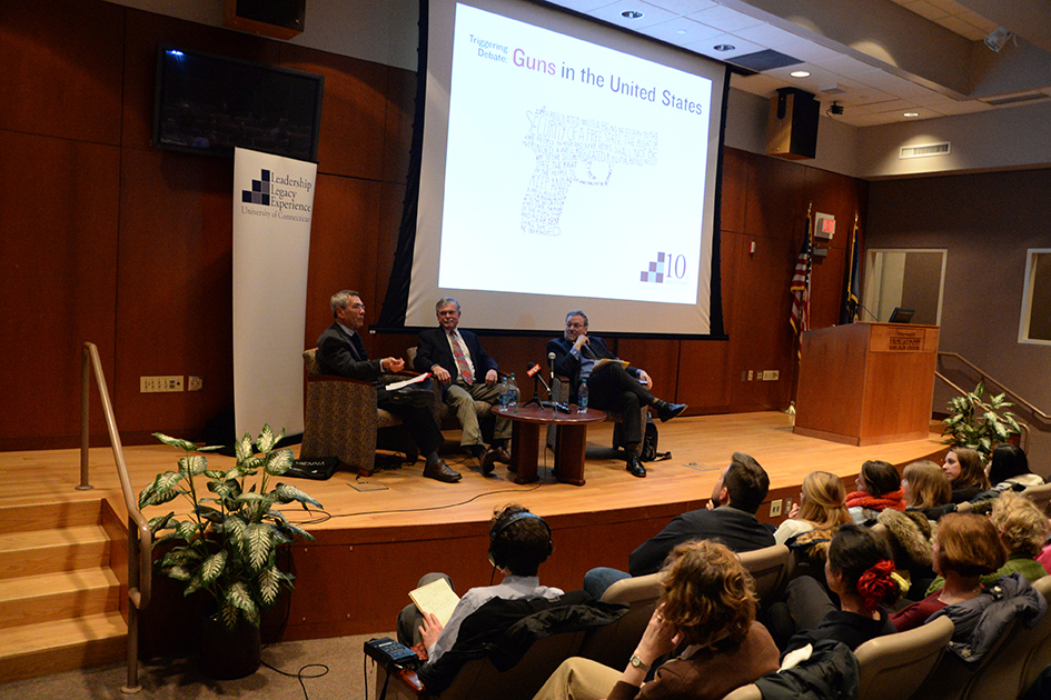 The Leadership Legacy Experience hosted Triggering Debate: Guns in the US in Konover auditorium on the evening of Wednesday, Feb. 24. Speakers from left to right: Moderator -UConn Law Associate Dean and Professor Richard Kay. Stephen Halbrook Attorny-at-all and defender of the gun rights side Professor of American History Saul Cornell of Fordham University defended the gun control side. (Amar Batra/The Daily Campus)