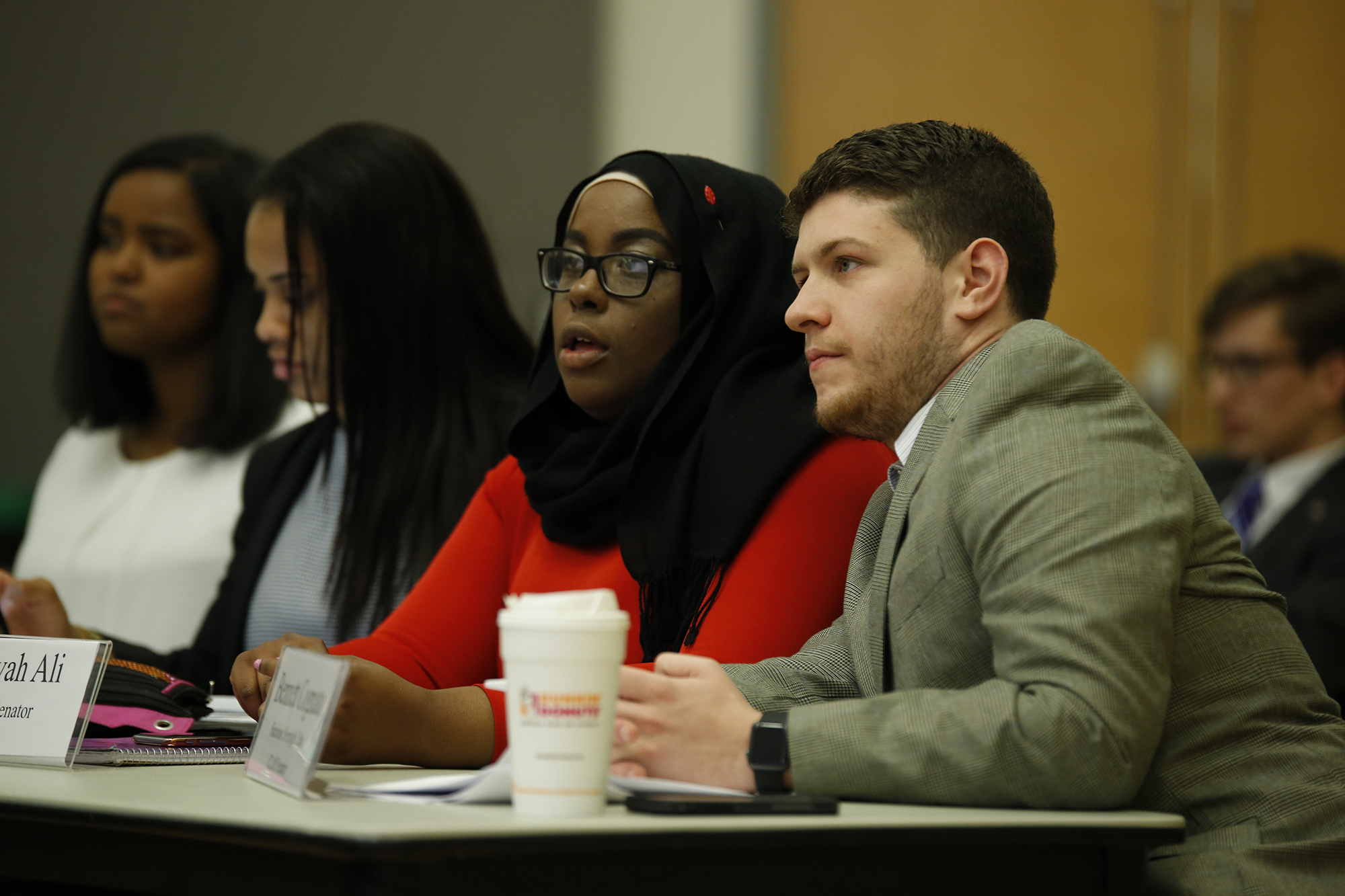 USG senators Haddiyyah Ali (left) and Bennett Cognato (right) pictured at a USG meeting in the UConn Student Union in Storrs, Connecticut on March 30, 2016. Ali authored the bill calling for UConn to revoke Bill Cosby's honorary degree, which he was awarded in 1996. (Tyler Benton/The Daily Campus)