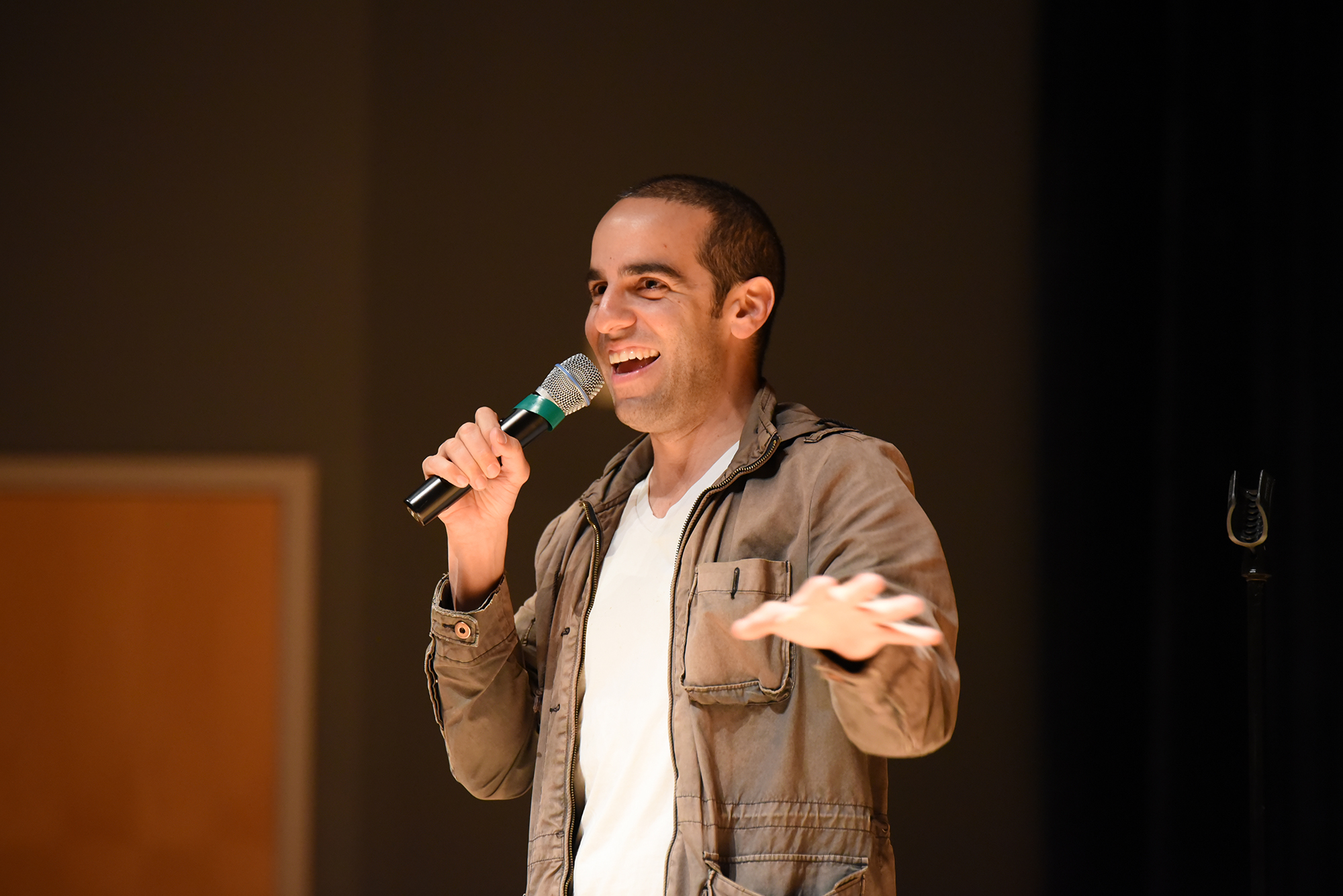 Comedian Dan Ahdoot during his show in the Student Union Theater in Storrs, Connecticut on Thursday, April 7, 2016. (Zhelun Lang/The Daily Campus)