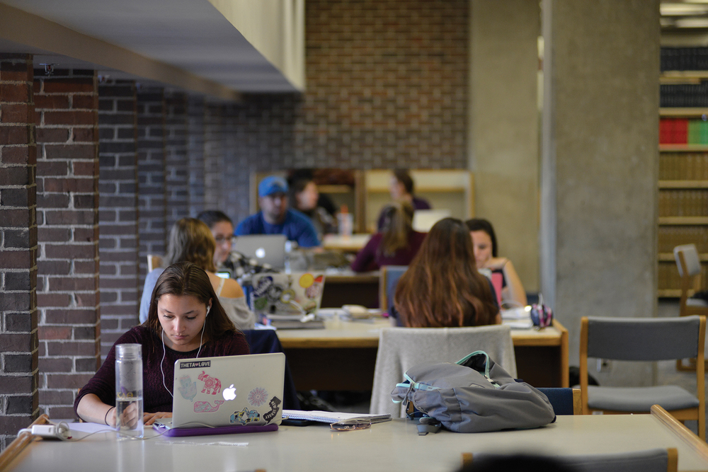 Students are seen working in the Homer Babbidge Library on UConn's Storrs campus. (Jason Jiang/The Daily Campus)