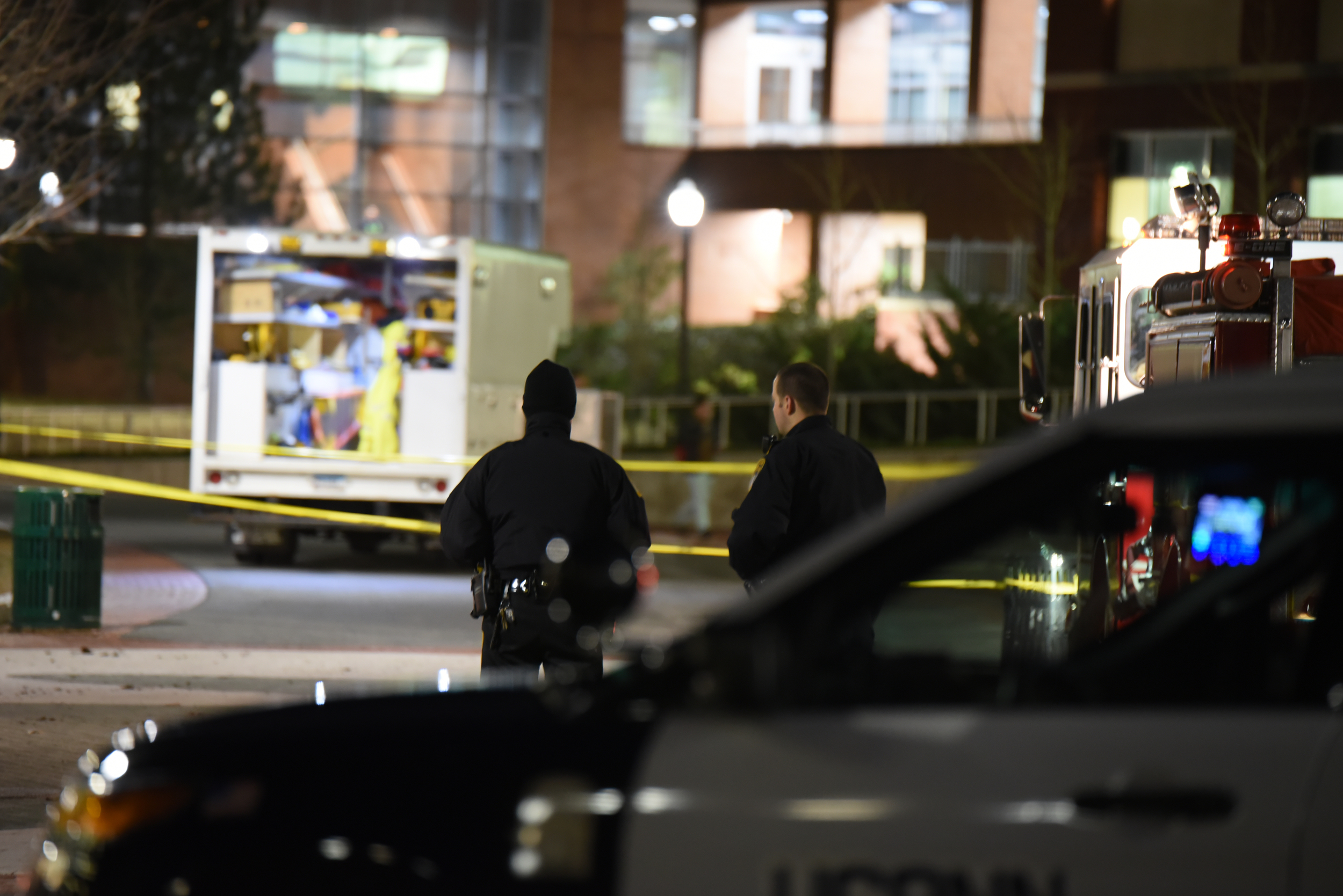 Two UConn police officers block off a portion of Fairfield Way in February. Since July 1st, all UConn police officers have worn body cameras. (Zhelun Lang/The Daily Campus)