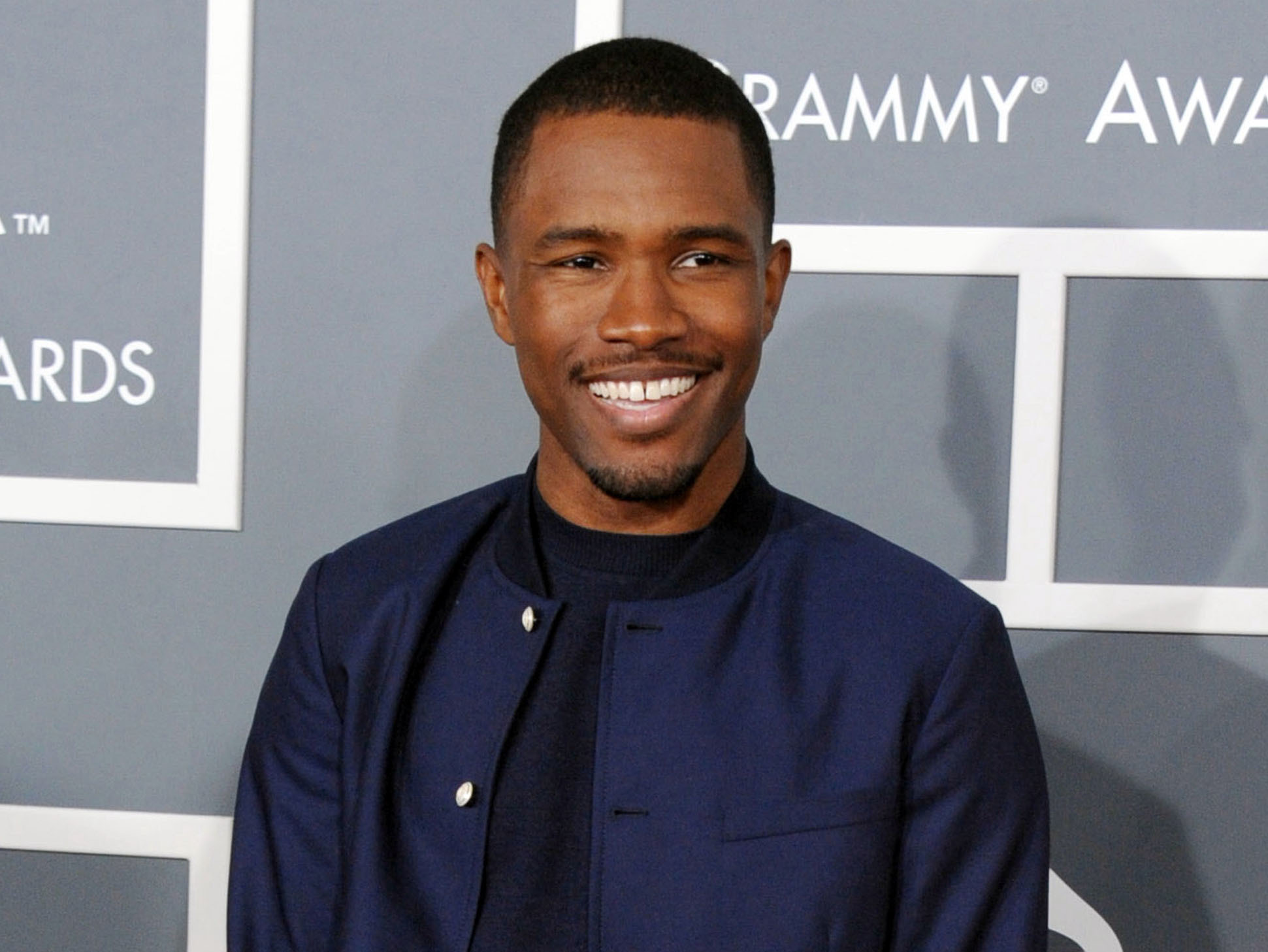 Frank Ocean arrives at the 55th annual Grammy Awards in Los Angeles on Feb. 13, 2013. Apple Music has released new and long-awaited music from Grammy award-winning singer. (Jordan Strauss/Invision via AP)