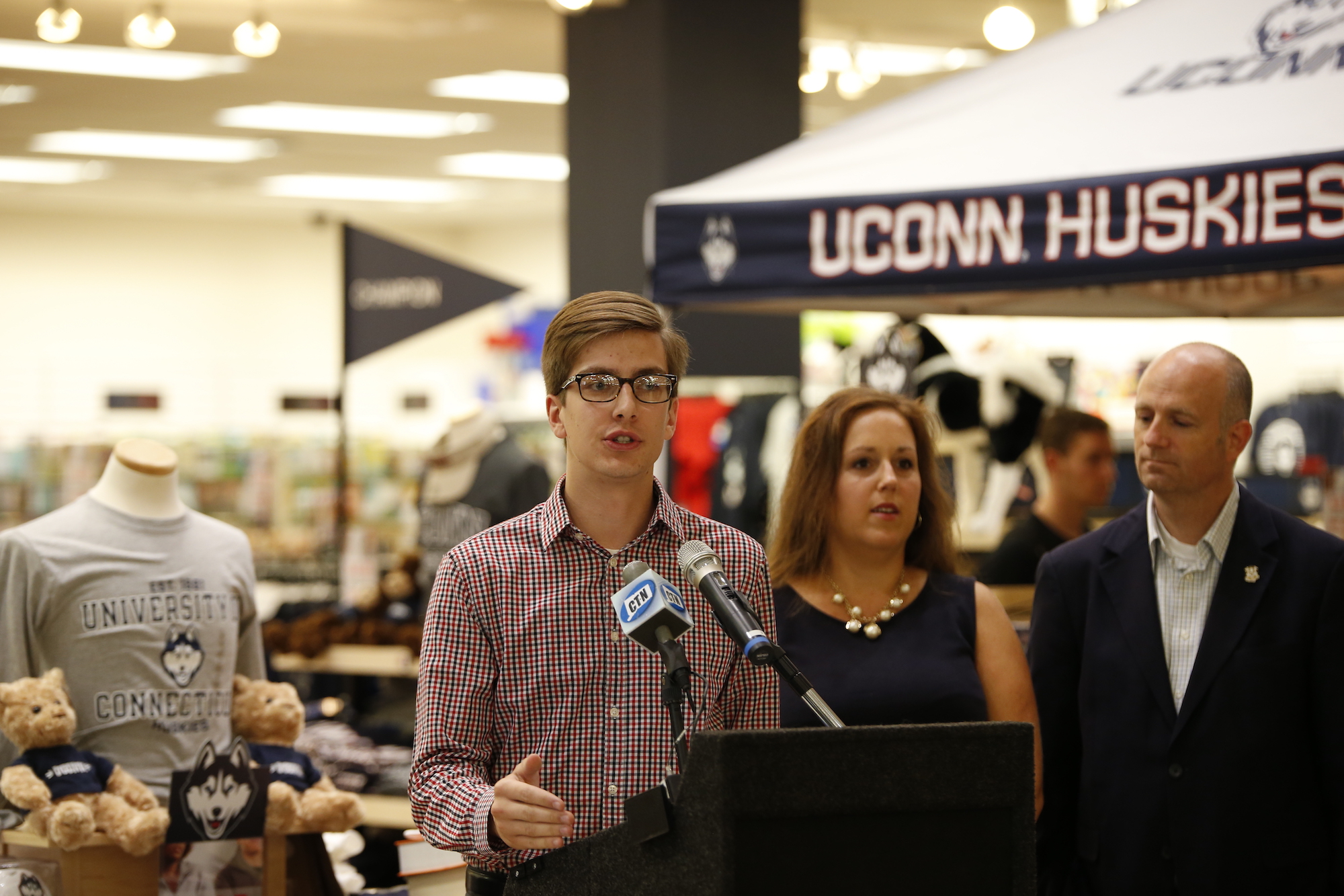 Undergraduate Student Government President Dan Byrd speaks at the UConn Bookstore press conference regarding open source textbooks on Tues., Sept. 6. State Representative Gregg Haddad (D-Mansfield) and Senator Mae Flexer (D- Killingly) were in attendance. (Tyler Benton/The Daily Campus)