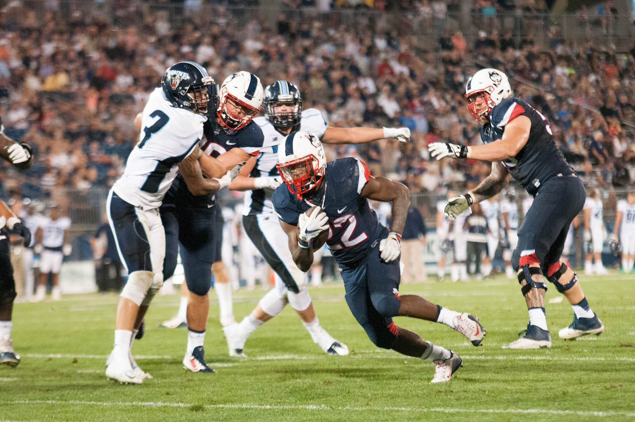 Arkeel Newsmen runs the ball during UConn's win against Maine, Sep. 1st, 2016. (Jackson Haigis/The Daily Campus)