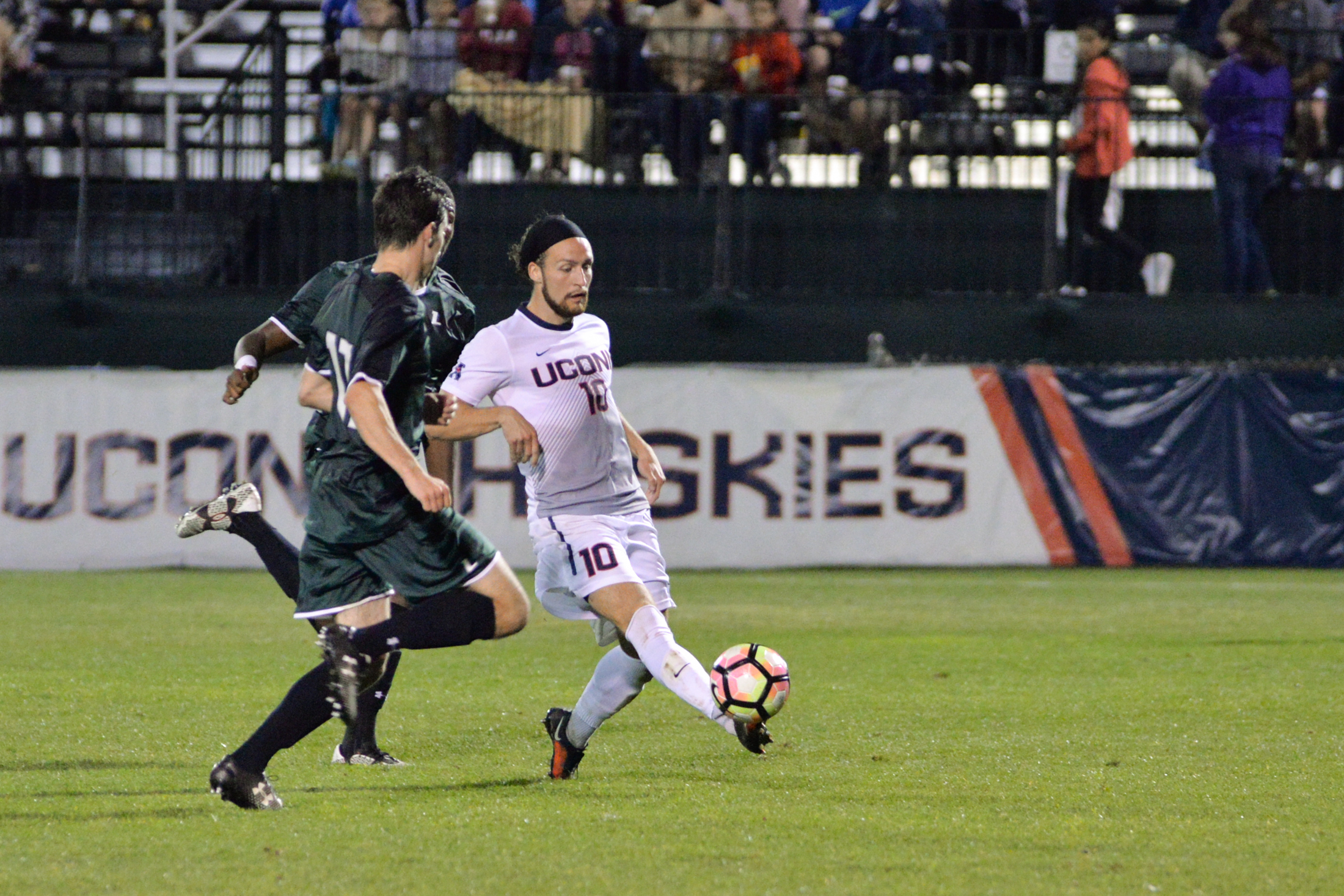 Sebastian Brems dribbles past defenders during UConn's 5-1 victory over Loyola on Saturday, Sept. 17, 2016 at Morrone Stadium. The Huskies look to continue their win streak on Wednesday as they travel to Providence to take on the Friars. (Amar Batra/The Daily Campus)