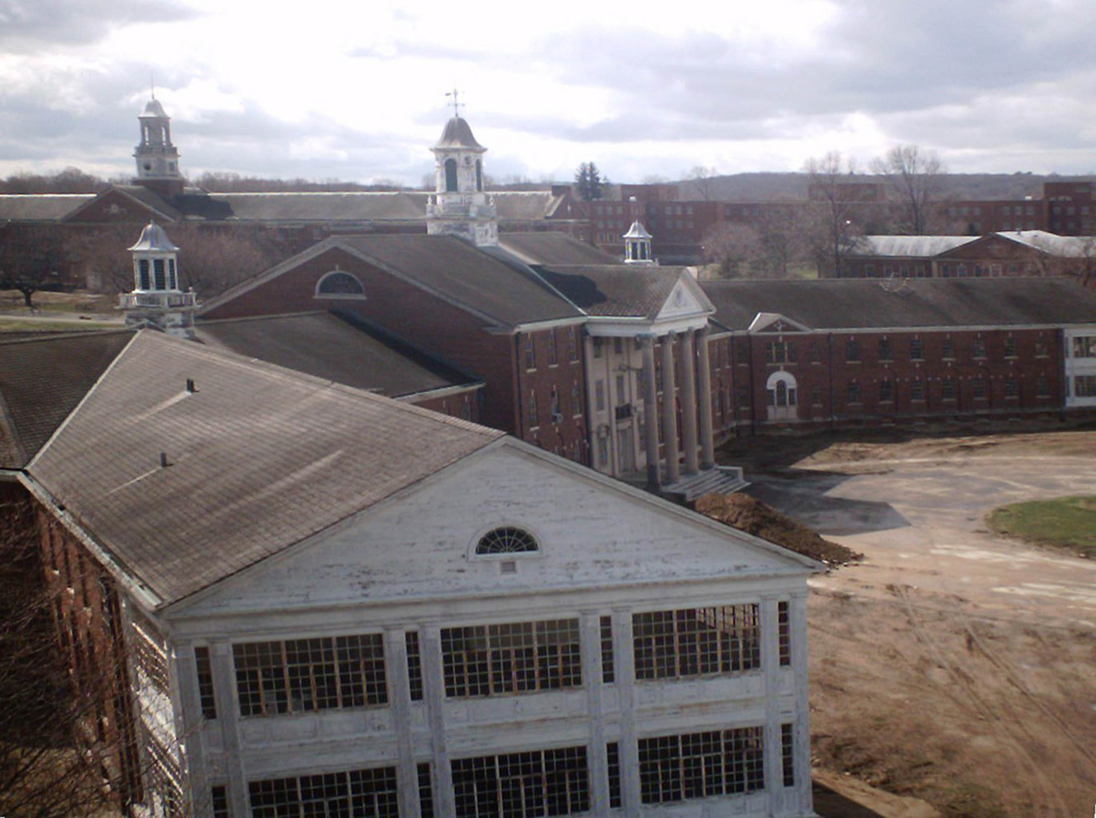 Fairfield Hills State Hospital was built in 1931 to house mentally ill patients. Stories of abuse, shock therapy, psychosurgery, countless suicides and mysterious deaths filled the walls of Fairfield Hills, leading to the hospital’s eventual closing in 1995. (G F/Flickr, Creative Commons)