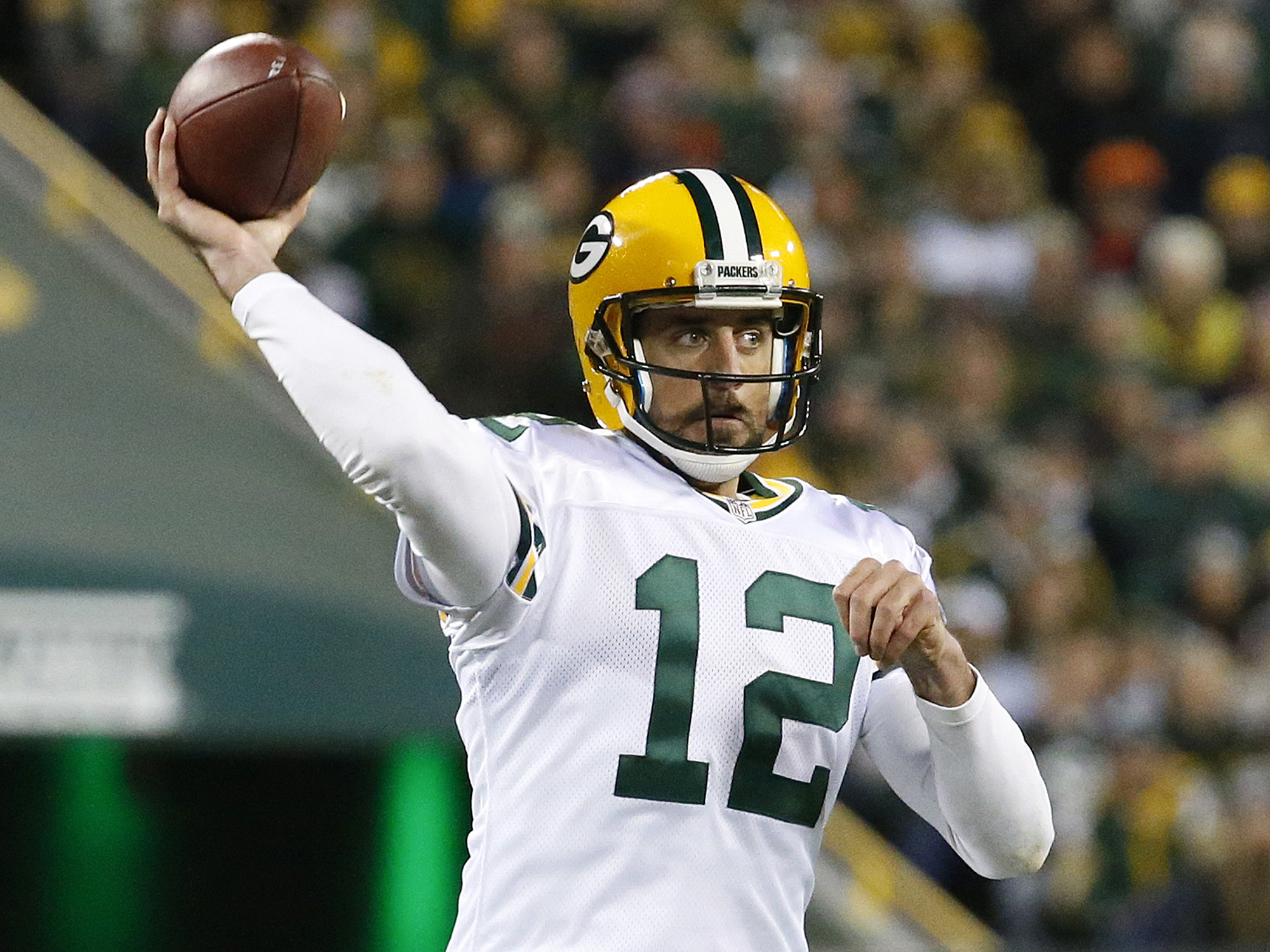 Green Bay Packers quarterback Aaron Rodgers (12) throws a pass during the first half of an NFL football game against the Chicago Bears, Thursday, Oct. 20, 2016, in Green Bay, Wis. (Mike Roemer/ AP)