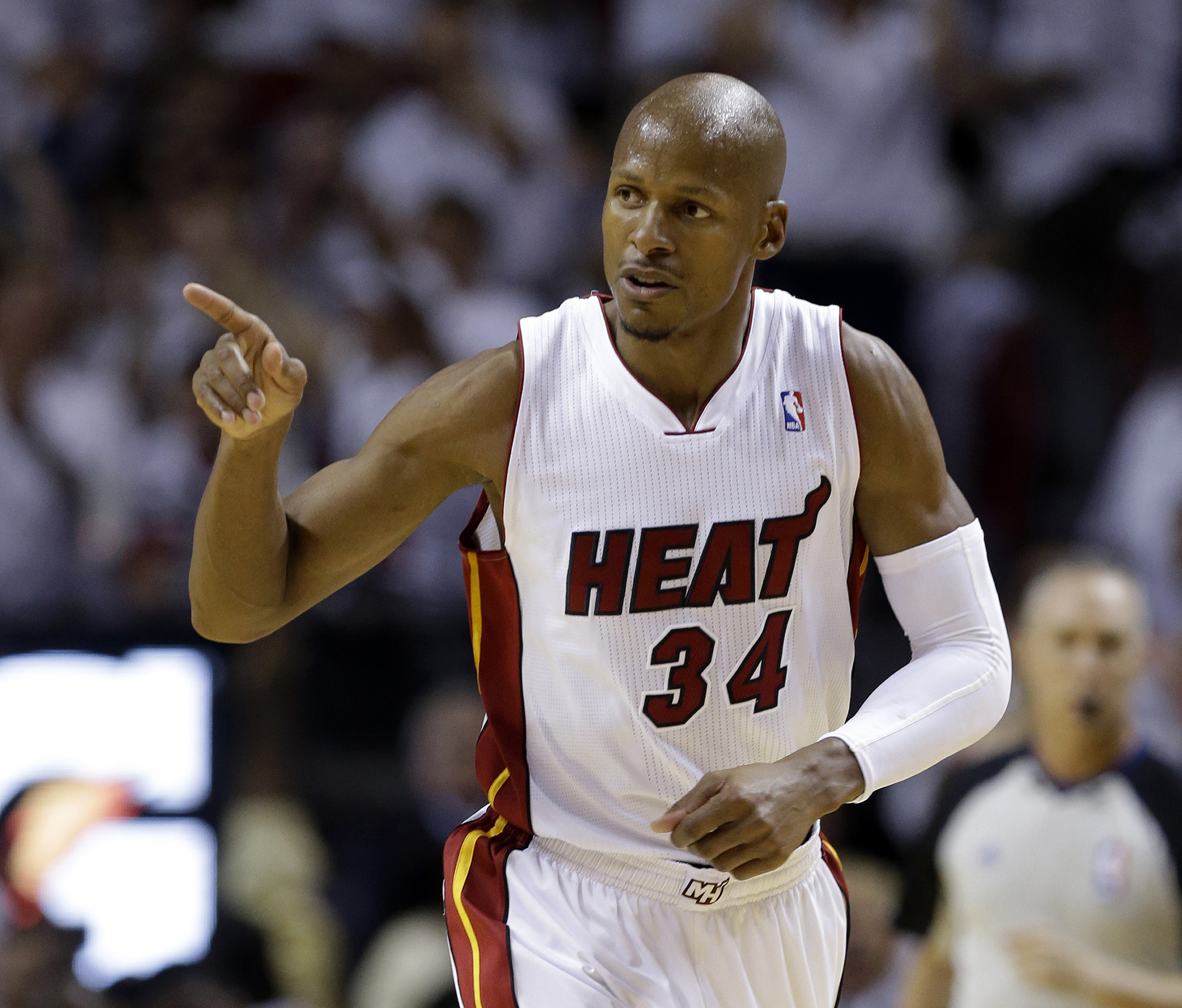 Miami Heat guard Ray Allen gestures after scoring a three-point basket during the first half Game 6 in the NBA basketball playoffs Eastern Conference finals against the Indiana Pacers, in Miami. Allen announced his retirement from the NBA on Tuesday, Nov. 1, 2016, ending a career that saw him make more 3-pointers than any player in league history and win championships with Boston and Miami. (Lynne Sladky/ AP)