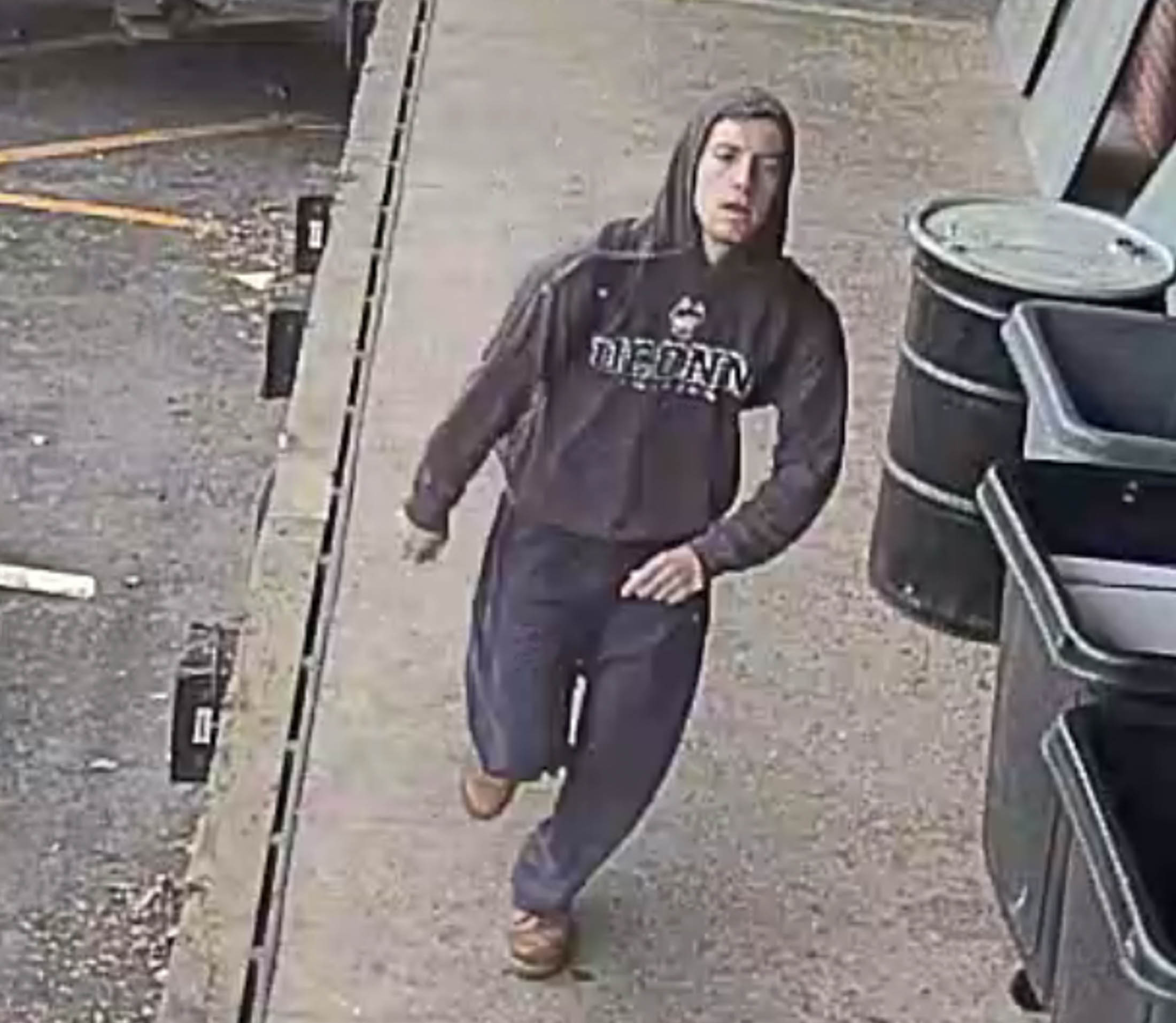 The now infamous "butt grabber" is caught running away on security camera footage on Nov. 3, 2016. He was later caught by UConn police. (Courtesy/UConn Police Department)