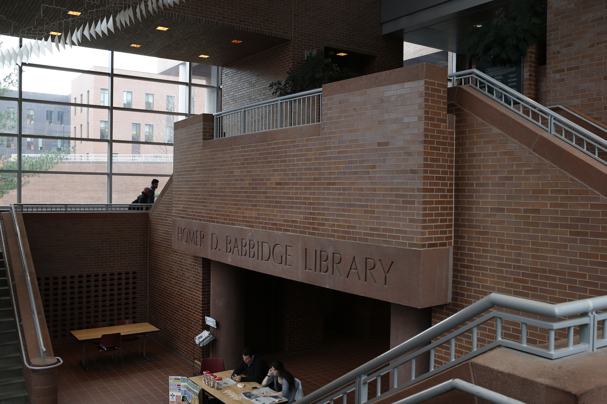 Members of UConnPIRG work to spread awareness regarding the effectiveness of open access textbooks and resources in the library on November 9, 2016. (Tyler Benton/The Daily Campus)