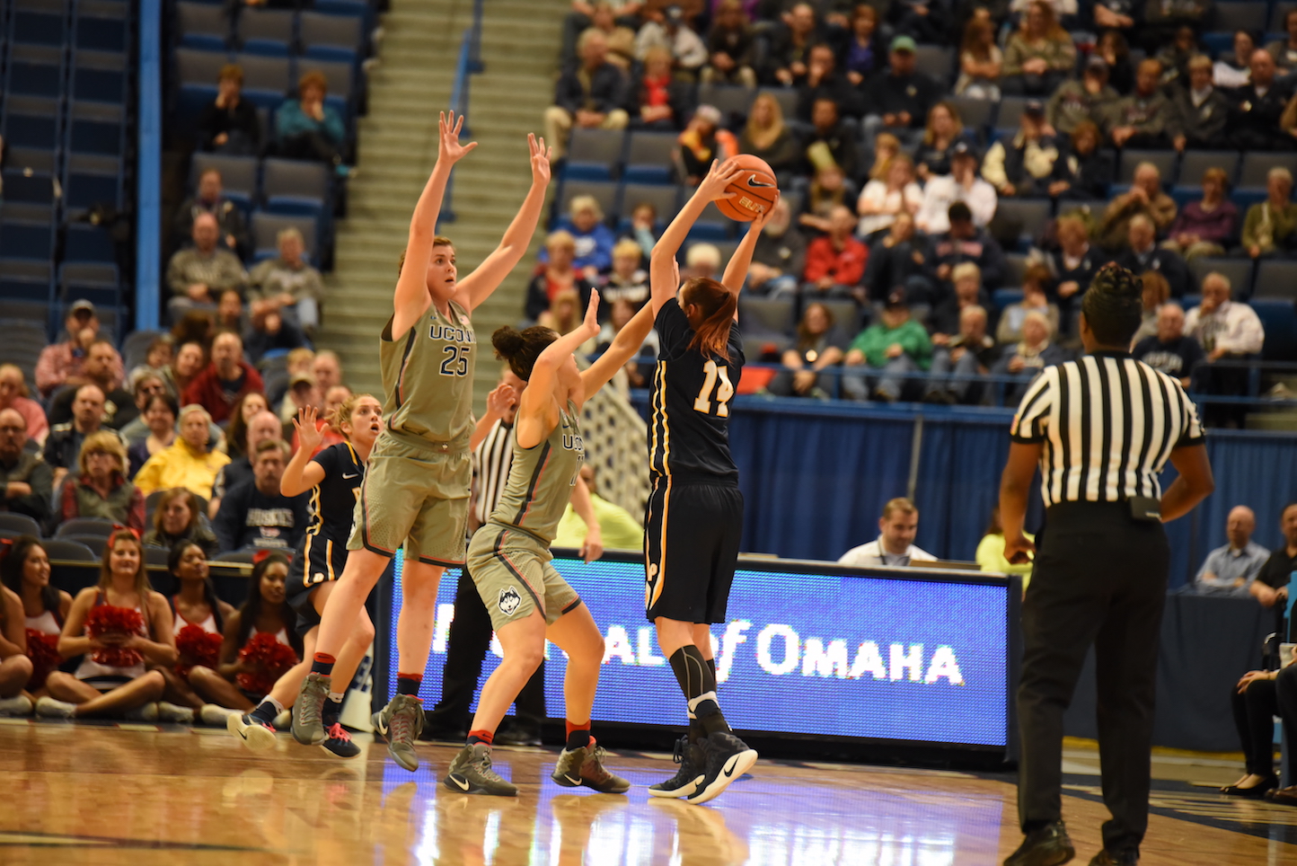 Uconn players lock a Pace player during a game on Nov. 6. The Huskies won 95-32. (Zhelun Lang/The Daily Campus)