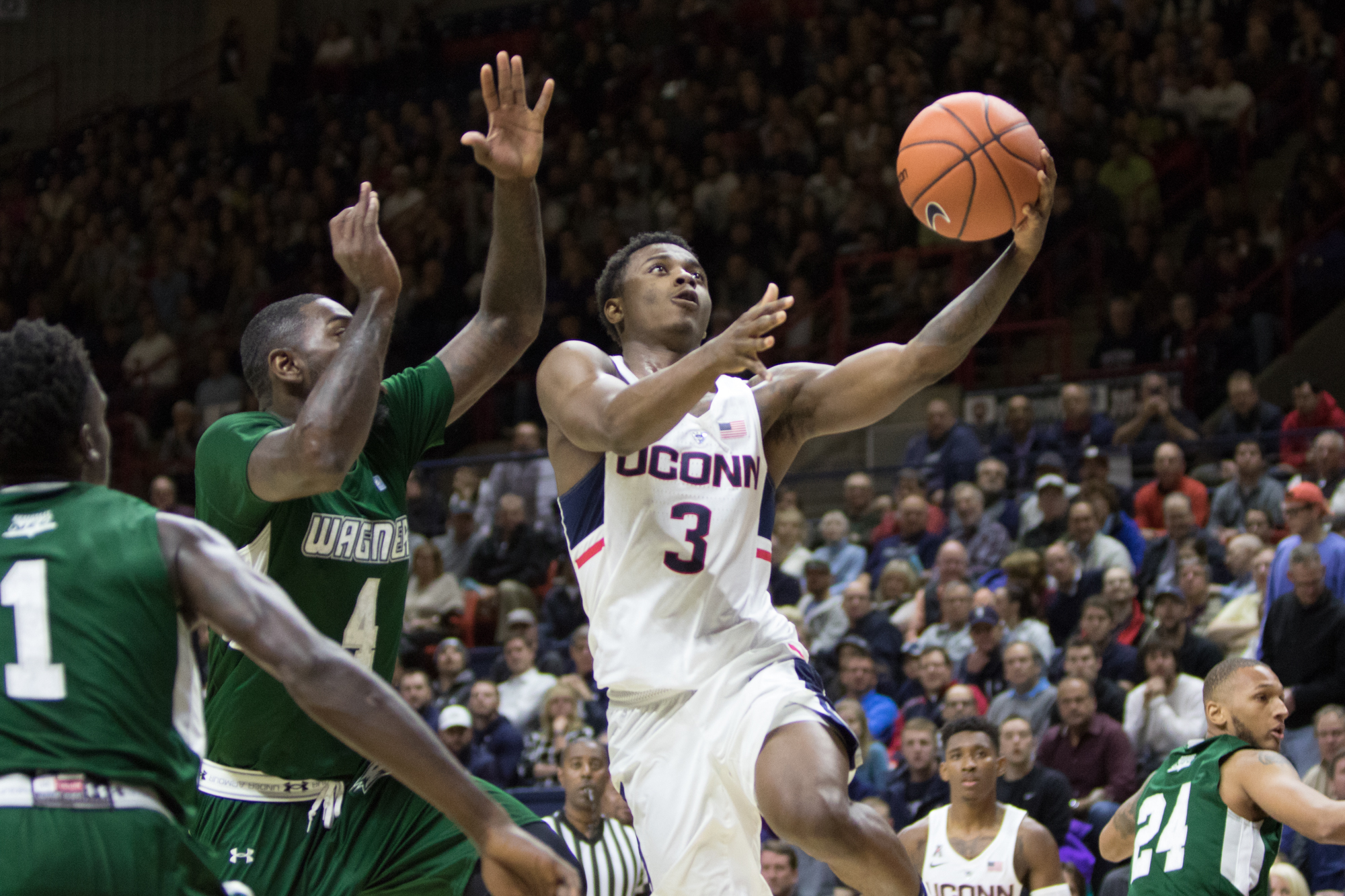 Freshman guard Alterique Gilbert goes up for a layup during the Huskies' 67-58 loss to Wagner on Friday, Nov. 11 at Gampel Pavilion. Gilbert scored 14 points in his first game as a Husky. (Jackson Haigis/The Daily Campus)