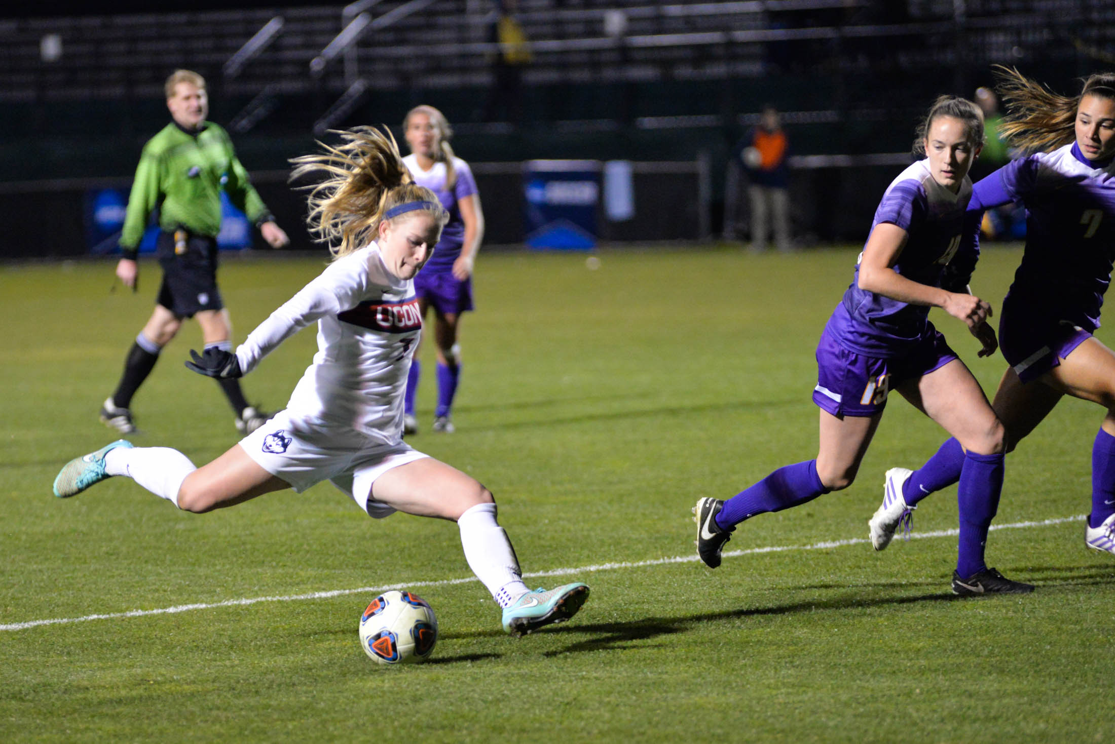 Senior midfielder Maddie Damm (7) fires off a goal during the Huskies 4-2 victory over the UAlbany Great Danes during the first round of the NCAA tournament on Saturday, Nov. 12, 2016. This is Damm's second goal of the season. (Amar Batra/The Daily Campus)