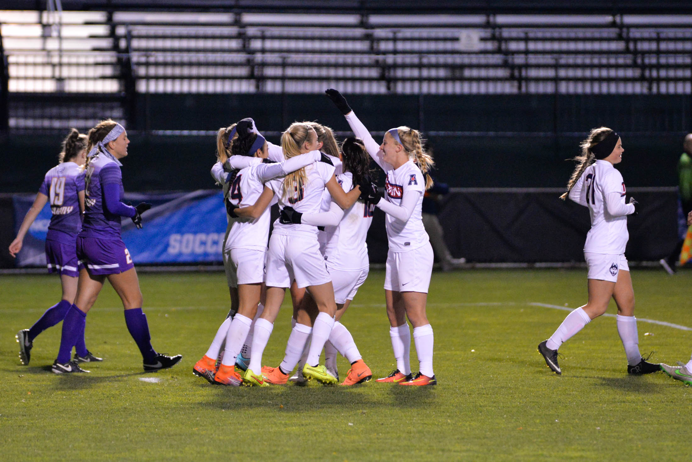 The team celebrates following midfielder Alexa Casmiro's (4) opening goal of the Huskies 4-2 victory over UAlbany in the first round of the NCAA tournament at Morrone Stadium on Saturday, Nov. 12, 2016. (Amar Batra/The Daily Campus)
