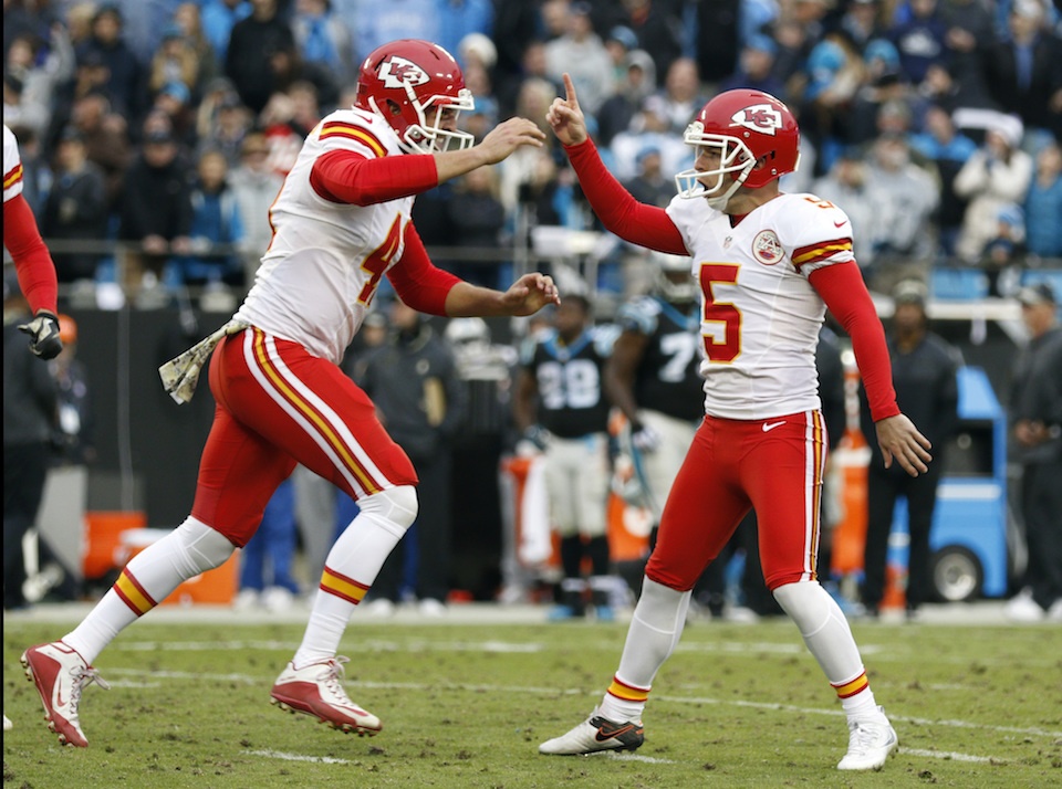 Kansas City Chiefs' Cairo Santos (5) celebrates with teammate James Winchester (41) after kicking the game-winning field goal against the Carolina Panthers in the final second of the second half of an NFL football game in Charlotte, N.C., Sunday, Nov. 13, 2016. (Bob Leverone/AP Photo)