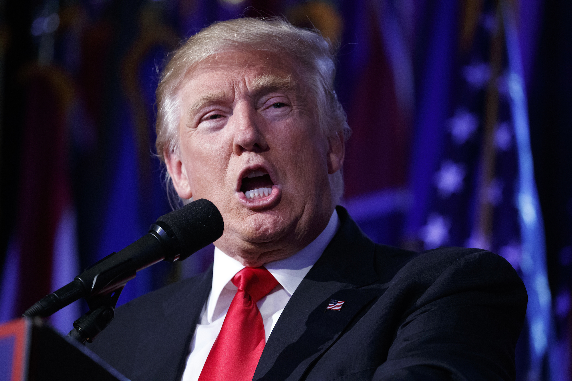 In this President-elect Donald Trump speaks during an election night rally, Wednesday, Nov. 9, 2016. (Evan Vucci/AP Photo)