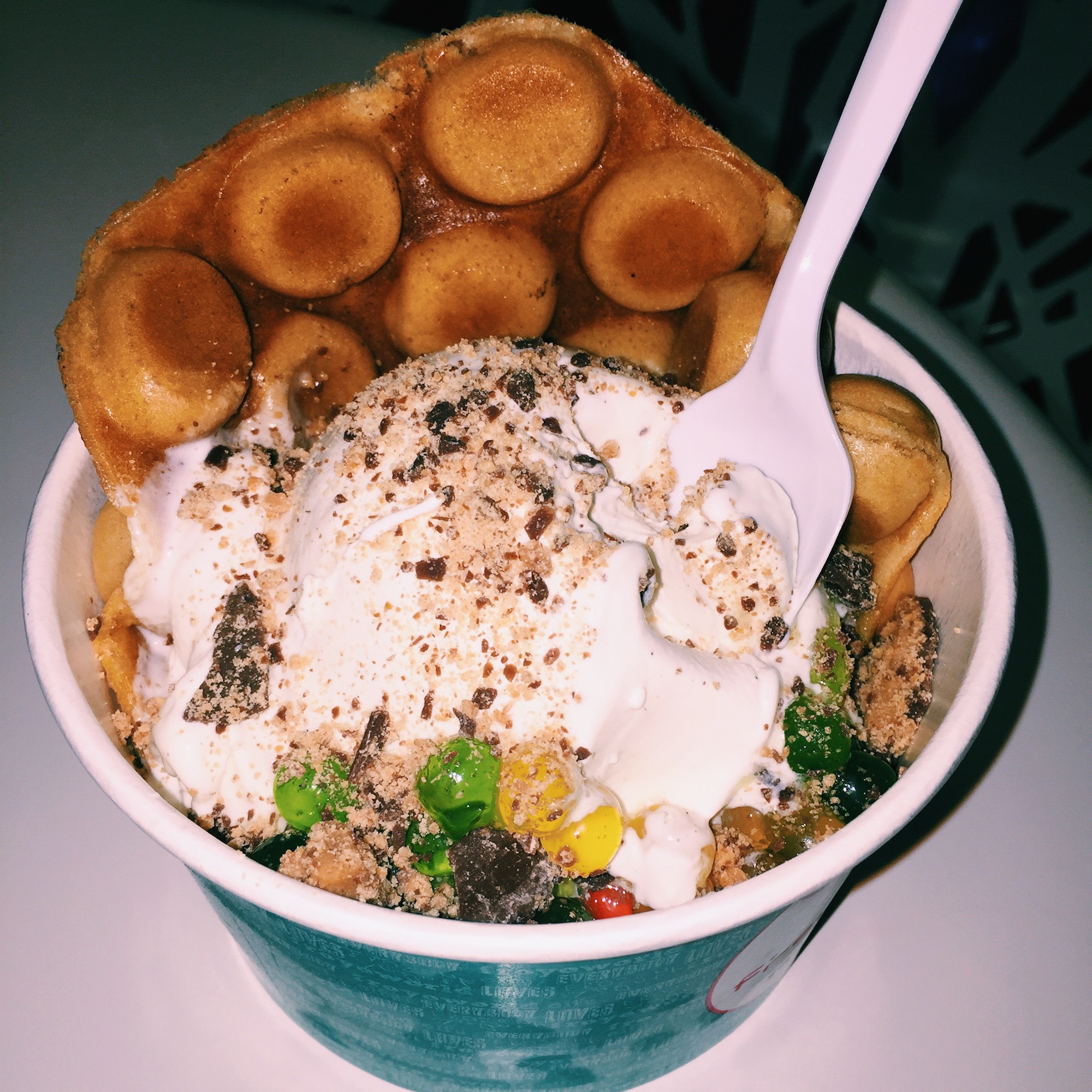 FroyoWorld's new ice cream, made in its Nitro Lab. The ice cream is paired with a bubbly waffle in this photo. (Chris Hanna/The Daily Campus)