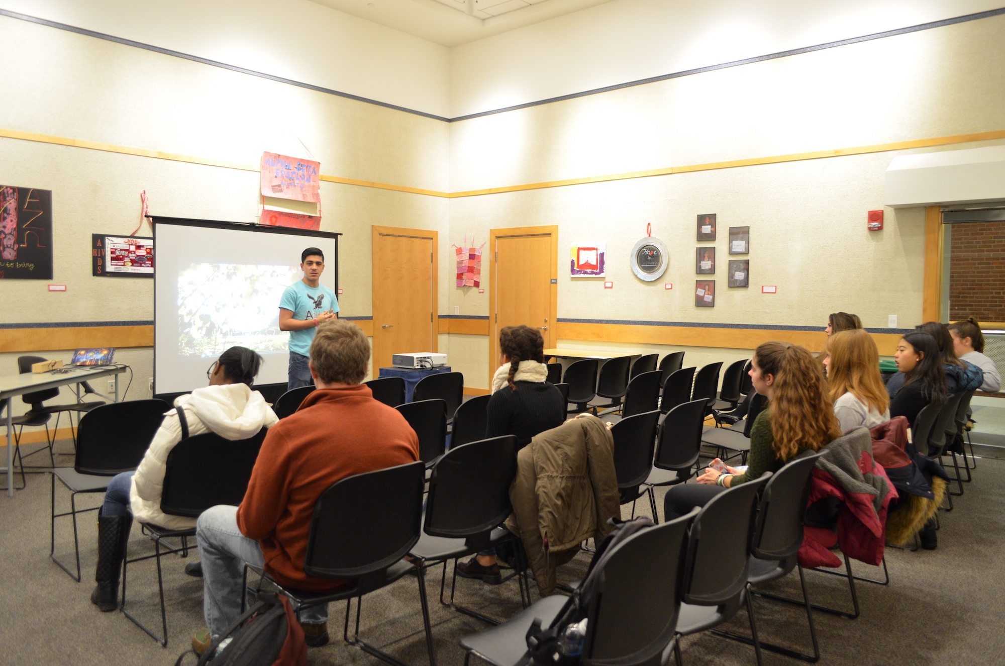 Students attended a film screening and post-film discussion of "Wilhelmina's War" in the Student Union Art Gallery on Monday, December 5. The film screening was held in honor of World AIDS Day. (Akshara Thejaswi/The Daily Campus)