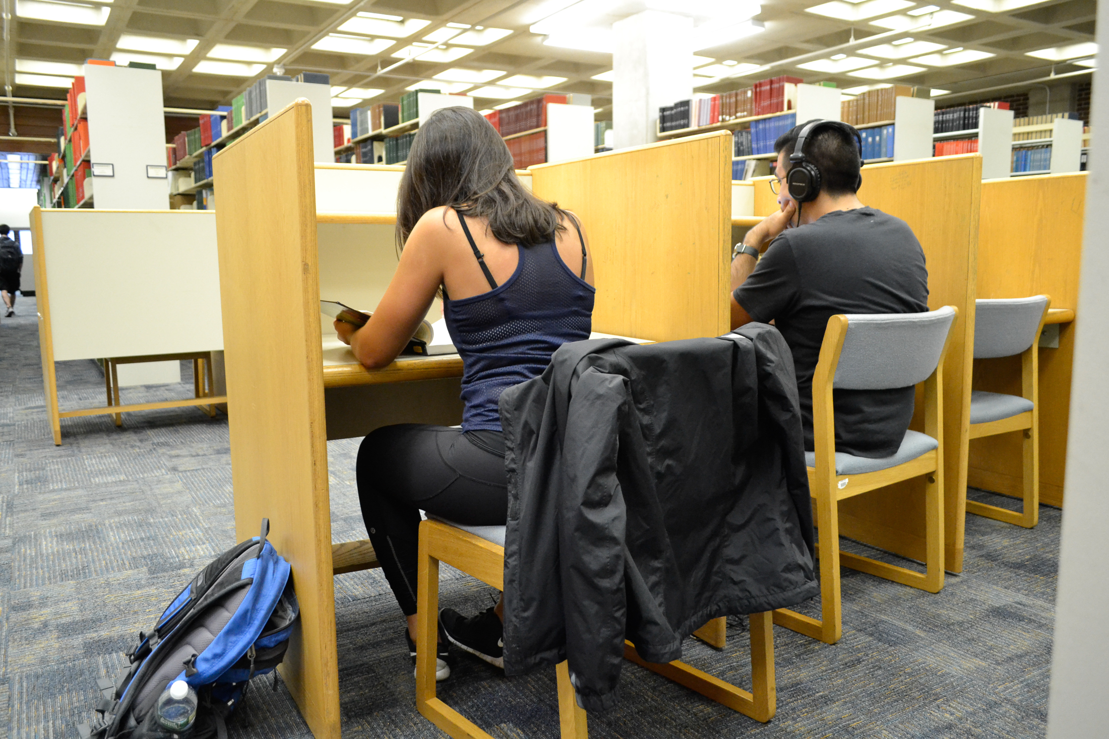 Students hit the books and prepare for exams by studying in the library. Homer Babbidge Library is the number one spot for students to go to prepare for finals. (Olivia Stenger/The Daily Campus)