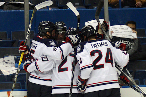 UConn's Benjamin Freeman celebrates with Maxim Letunov and David Drake during the Huskies 3-1 win over UMass. (Ian Bethune/The UConn Blog)