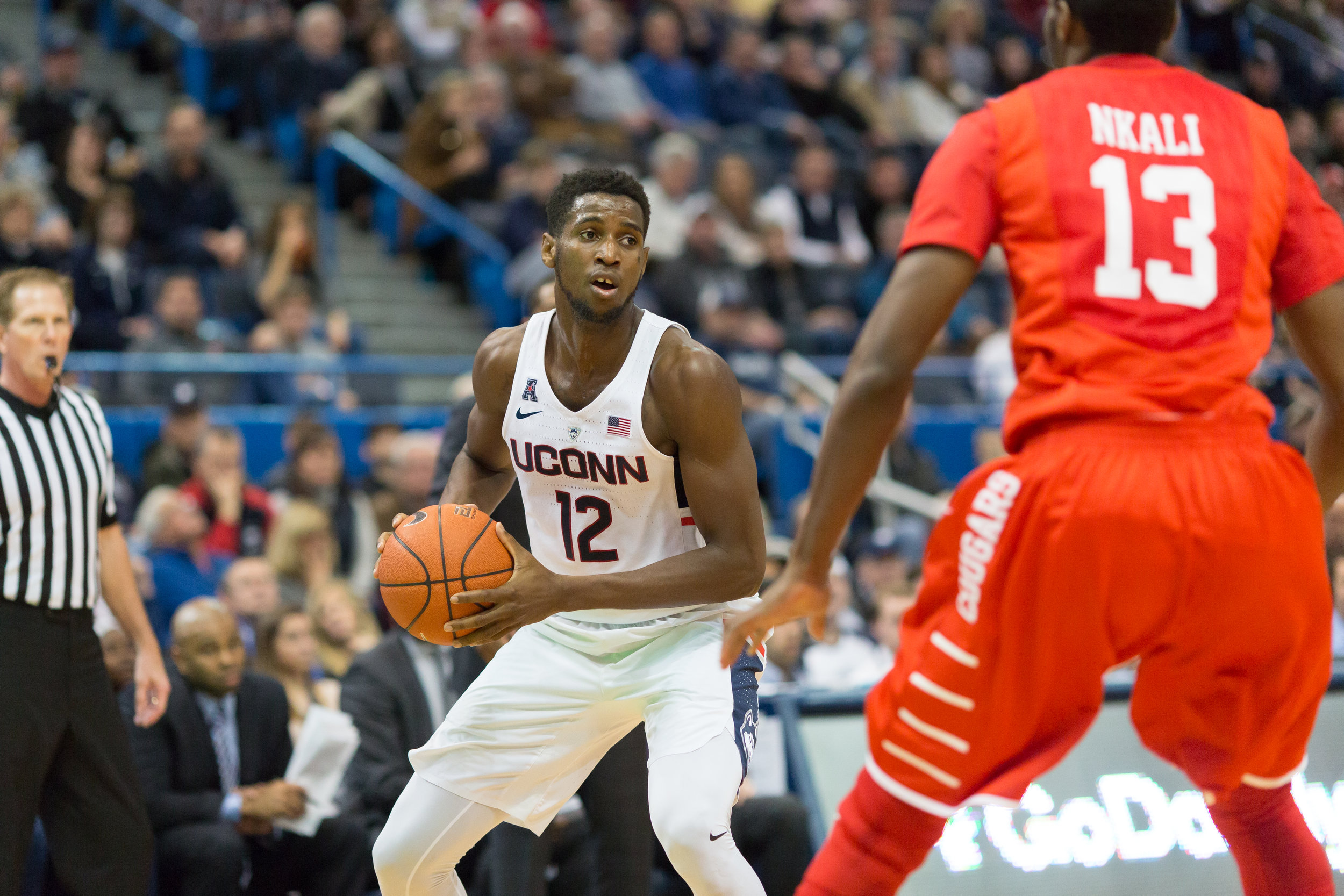 Kentan Facey looks to pass during UConn's 62-46 loss to Houston on Wednesday, Dec. 28, 2016 at the XL Center in Hartford. The Huskies will conclude their brief road stint when they take on Memphis at Memphis in search of their first conference win. (Tyler Benton/The Daily Campus)