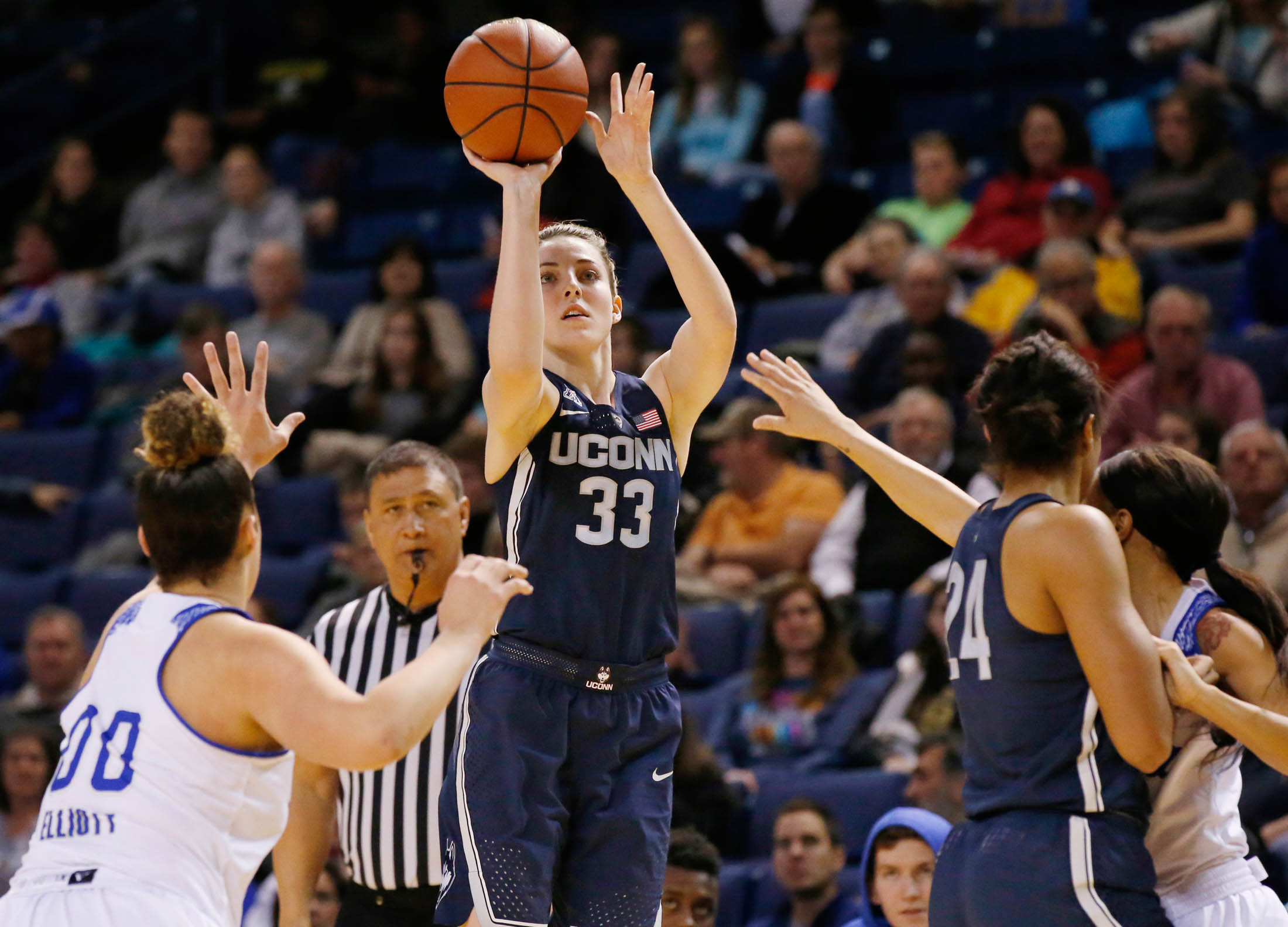 Connecticut's Katie Lou Samuelson (33) shoots in front of Tulsa forward Kendrian Elliott (00), UConn's Napheesa Collier (24) and Tulsa's Ebony Parker, right, during the first quarter of an NCAA basketball game in Tulsa, Okla., Tuesday, Jan. 17, 2017. (Sue Ogrocki/AP)