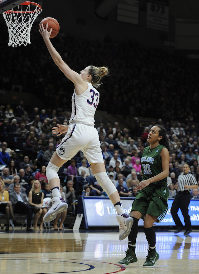Connecticut's Katie Lou Samuelson, left, goes up for a basket after a breakaway steal as Tulane's Courtnie Latham, right, looks on in the second half of an NCAA college basketball game, Sunday, Jan. 22, 2017, in Storrs, Conn. (AP Photo/Jessica Hill)