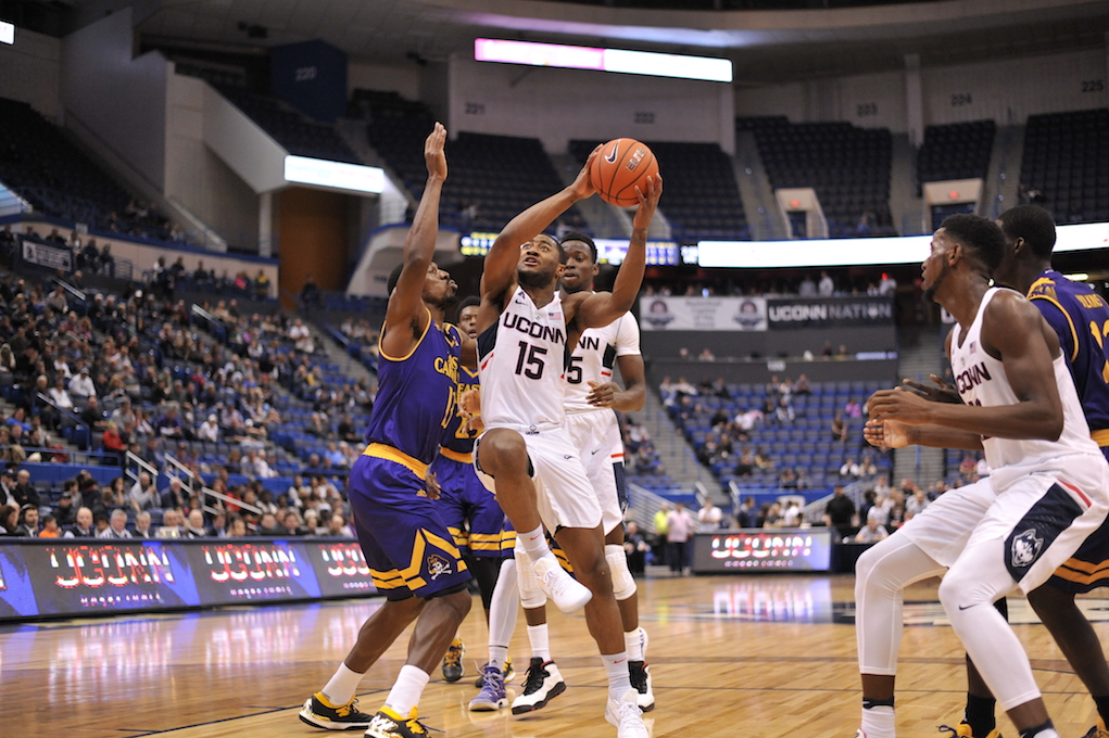 UConn's Rodney Purvis drives the lane while teammate Kentan Facey looks on in a win over ECU on January 22 at the XL Center. (Jason Jiang/The Daily Campus)