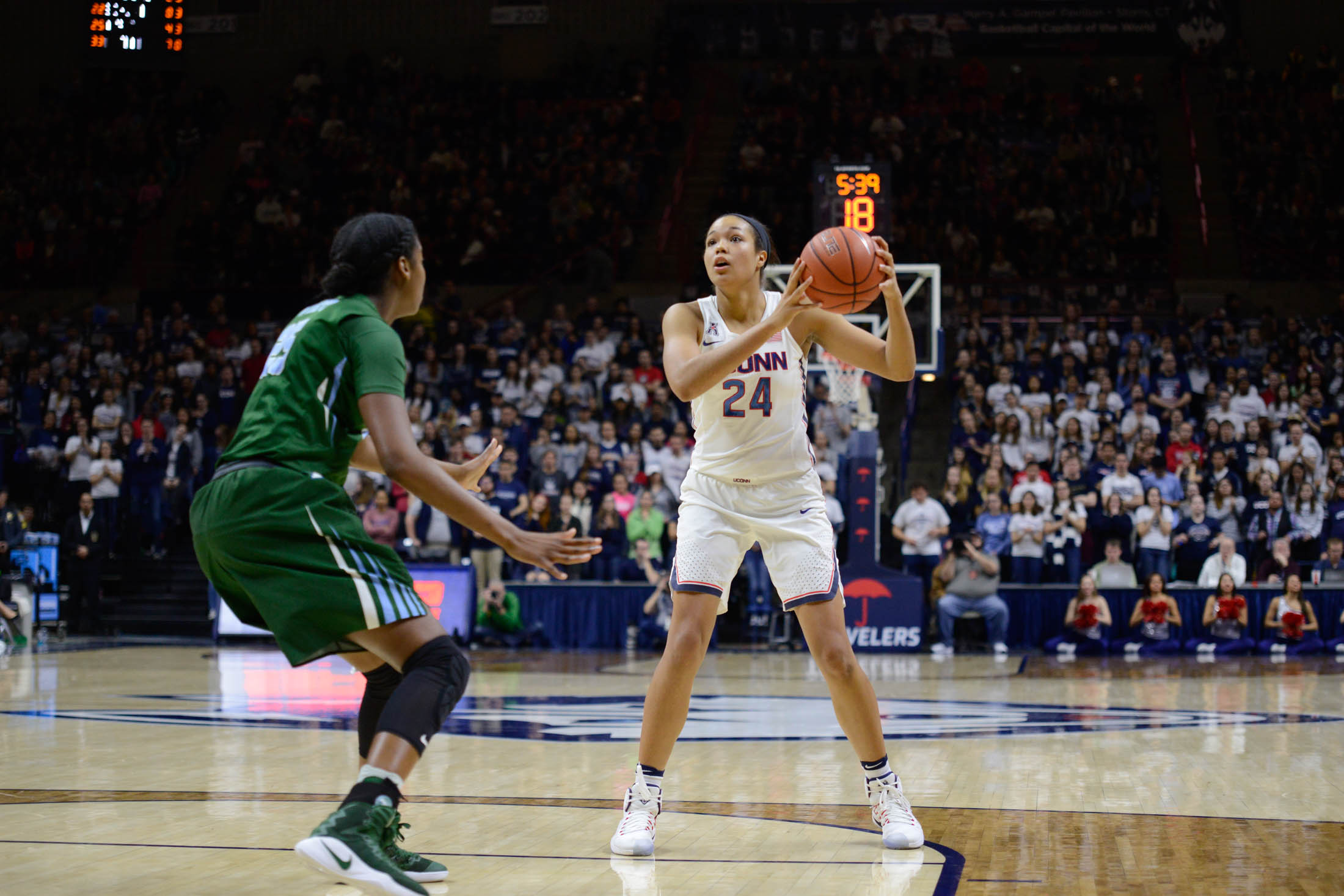 Sophomore forward Napheesa Collier (24) looks to pass in the Huskies' game against Tulane on Saturday, Jan. 22nd at Gampel Pavilion. (Jason Jiang/The Daily Campus)