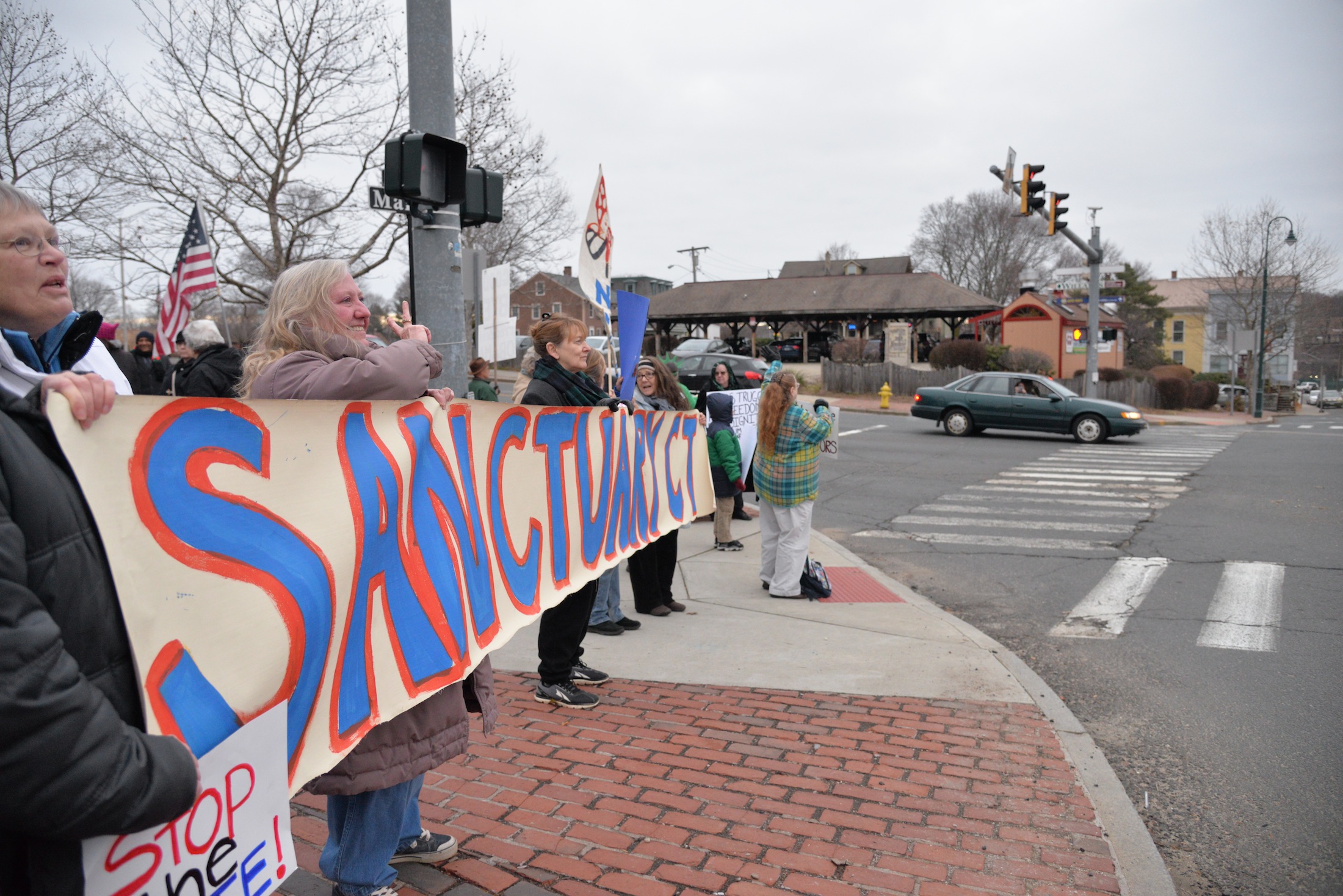 Willimantic and Windham residents gather in in Willimantic on Friday, January 20th to show their support for undocumented students and immigrants in the face of Donald J. Trump's inauguration. (Amar Batra/The Daily Campus)