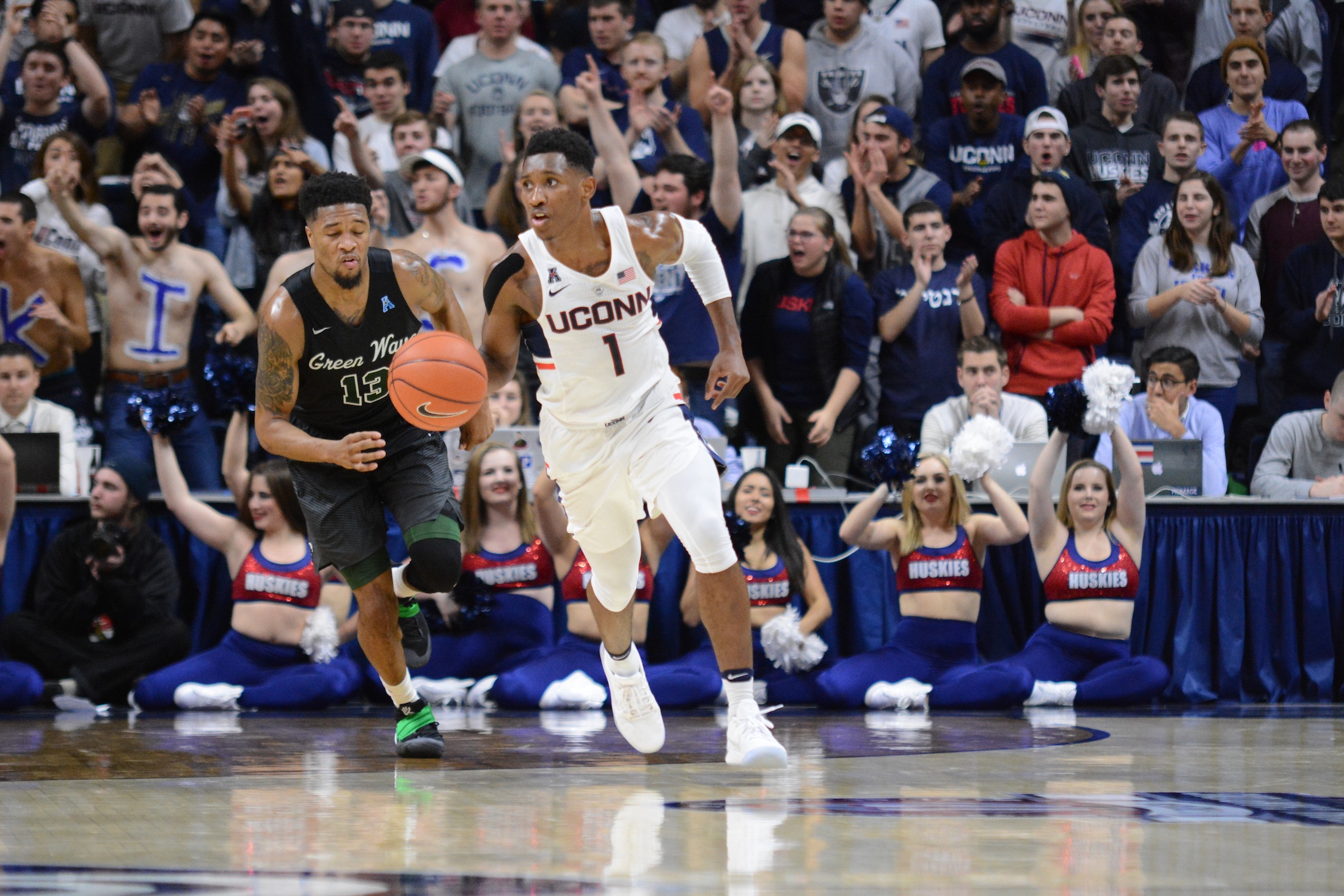Christian Vital dribbles up the court in UConn's game against Tulane on January 28th, 2017. (Jason Jiang/The Daily Campus)