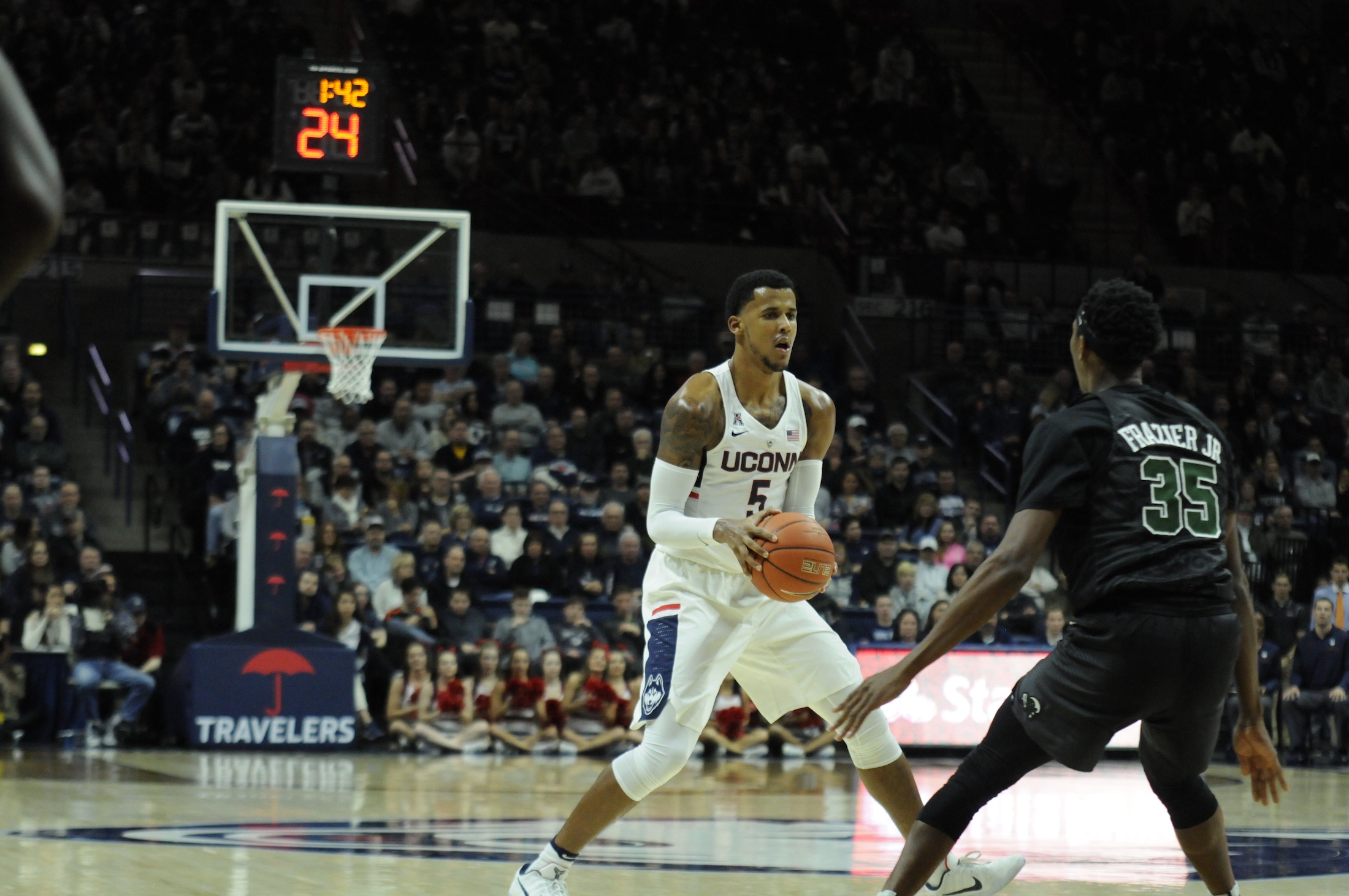 Vance Jackson looks to pass during UConn's game against Tulane on January 28th, 2017. (Olivia Stenger/The Daily Campus)