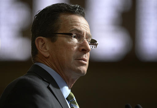 Connecticut Gov. Dannel P. Malloy delivered his budget address to members of the house and senate inside the Hall of the House at the state Capitol in Hartford, Conn., Wednesday, Feb. 8, 2017. His proposal would result in a 4 percent reduction in UConn's state funding. (AP Photo/Jessica Hill)